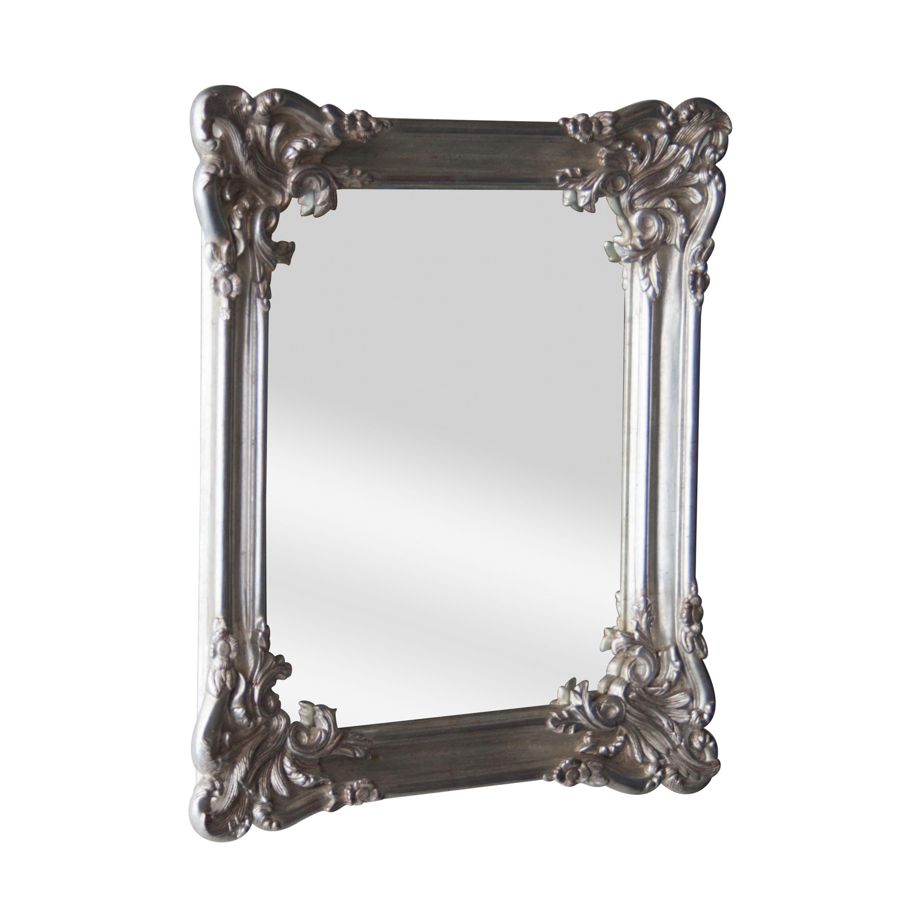 Neoclassical Regency style handcrafted mirror. Rectangular hand carved wooden structure with silver foiled finish, Spain, 1970.