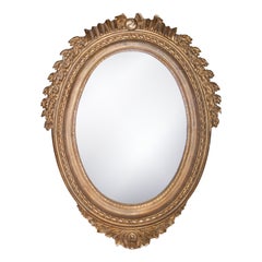 Specchio in legno intagliato a mano in lamina d'oro d'acanto in stile Neoclassico Regency, 1970