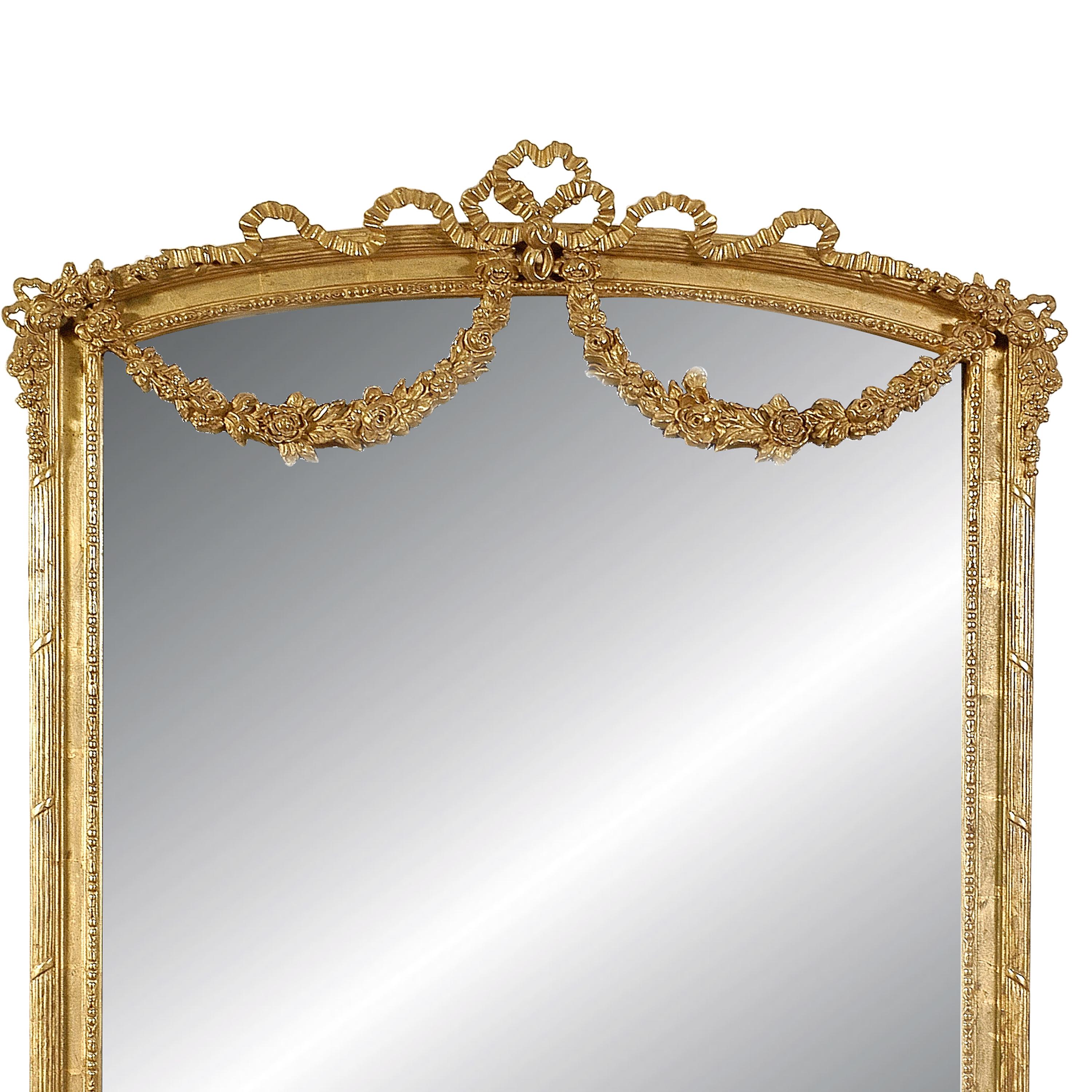 Neoclassical Regency style handcrafted mirror. Rectangular and carved wooden structure with gold foil finished. Spain, 1970.