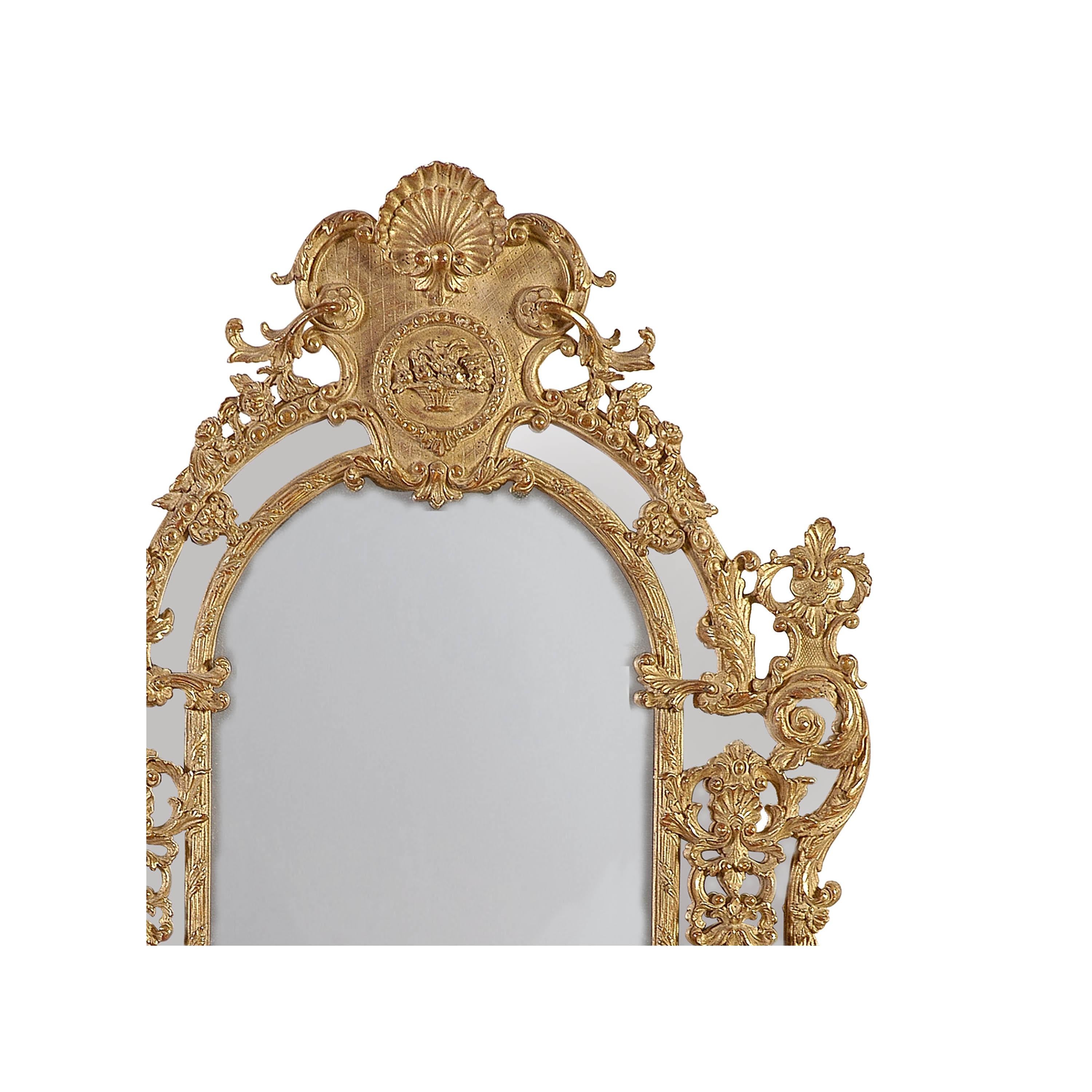 Neoclassical Regency style handcrafted mirror. Rectangular hand carved wooden structure with gold foil finished, Spain, 1970.