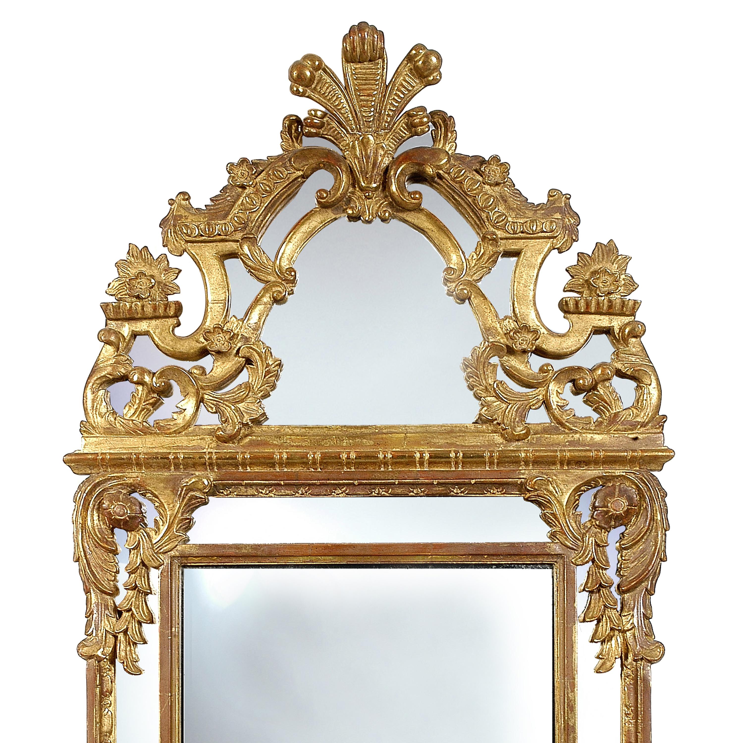 Neoclassical Regency style handcrafted mirror. Rectangular hand carved wooden structure with gold foil finished, Spain, 1970.