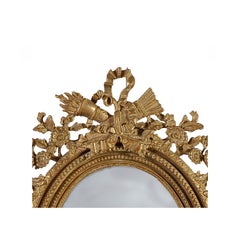 Specchio rotondo in legno intagliato a mano in lamina d'oro in stile Neoclassico Regency, 1970