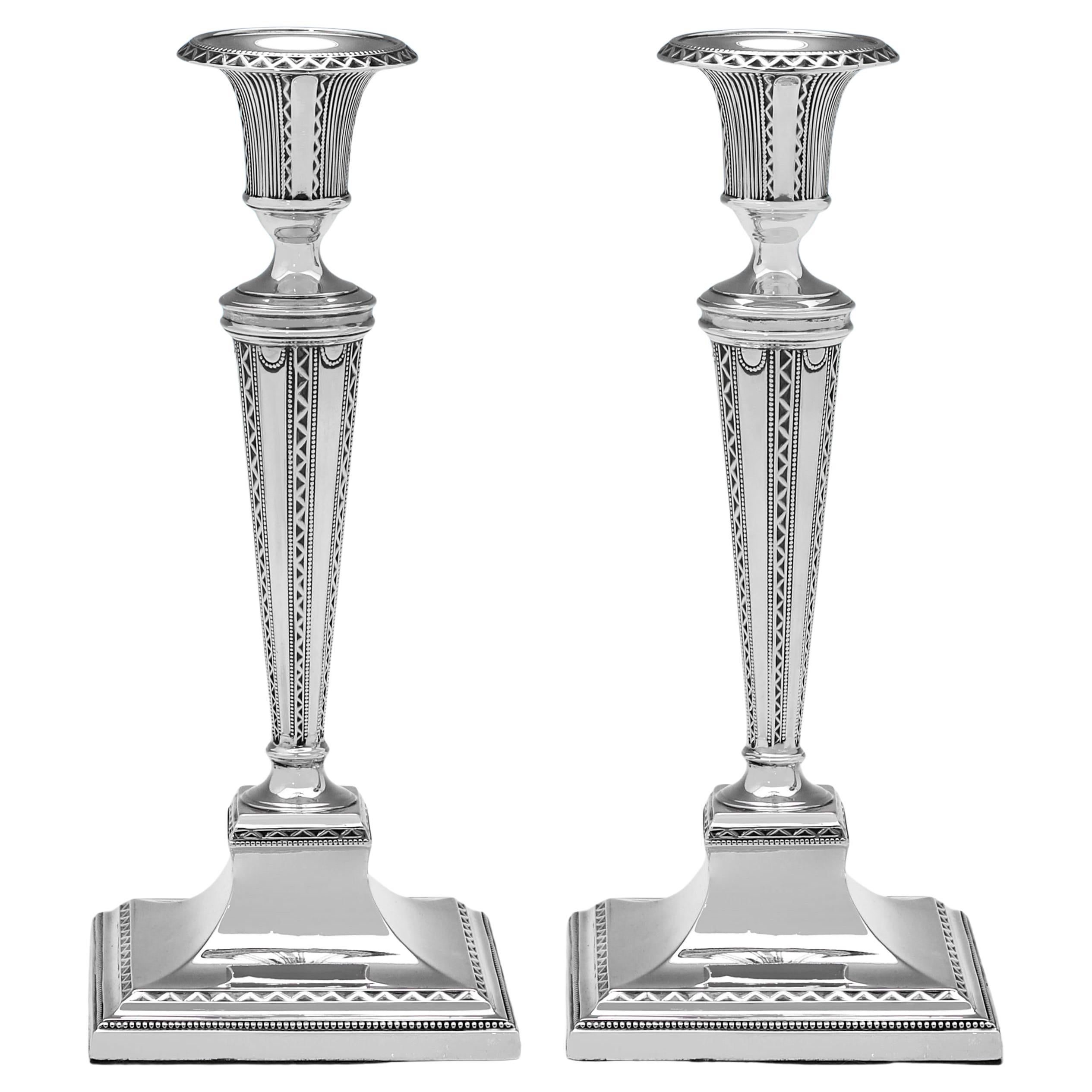 Neoclassical revival antique sterling silver candlesticks made in Sheffield 1911
