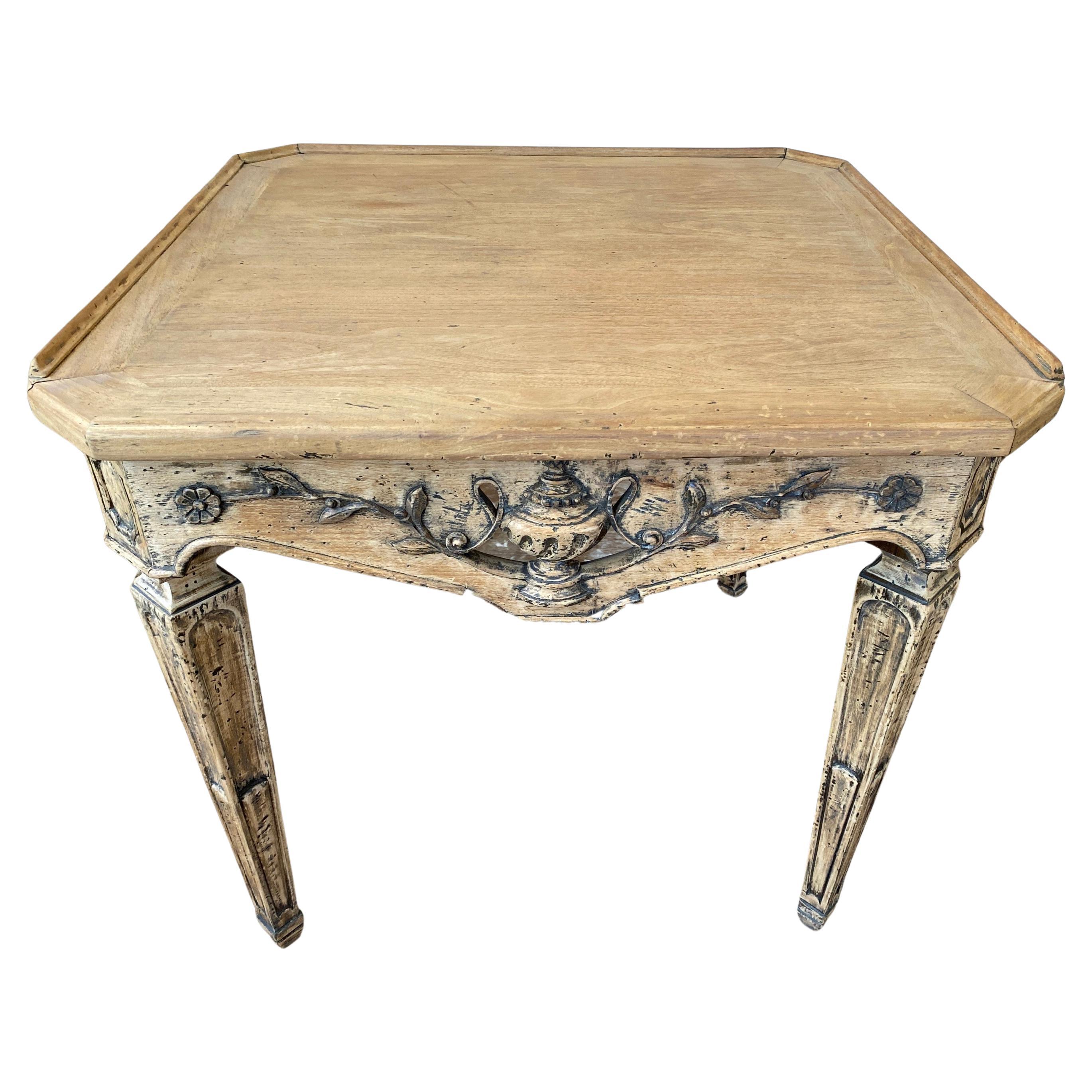 Elegant and rustic at the same time, this neocassical carved wood square coffee, side or end table has a rail on 3 sides.