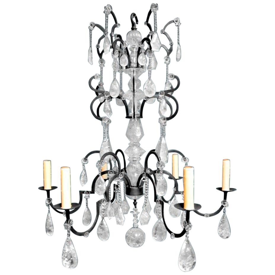 Elegant Neoclassical style hand carved and polished rock crystal mounted forged wrought iron six light chandelier.
Meticulous attention is given to every detail.
The description and photos for this chandelier is the standard size (H. 48