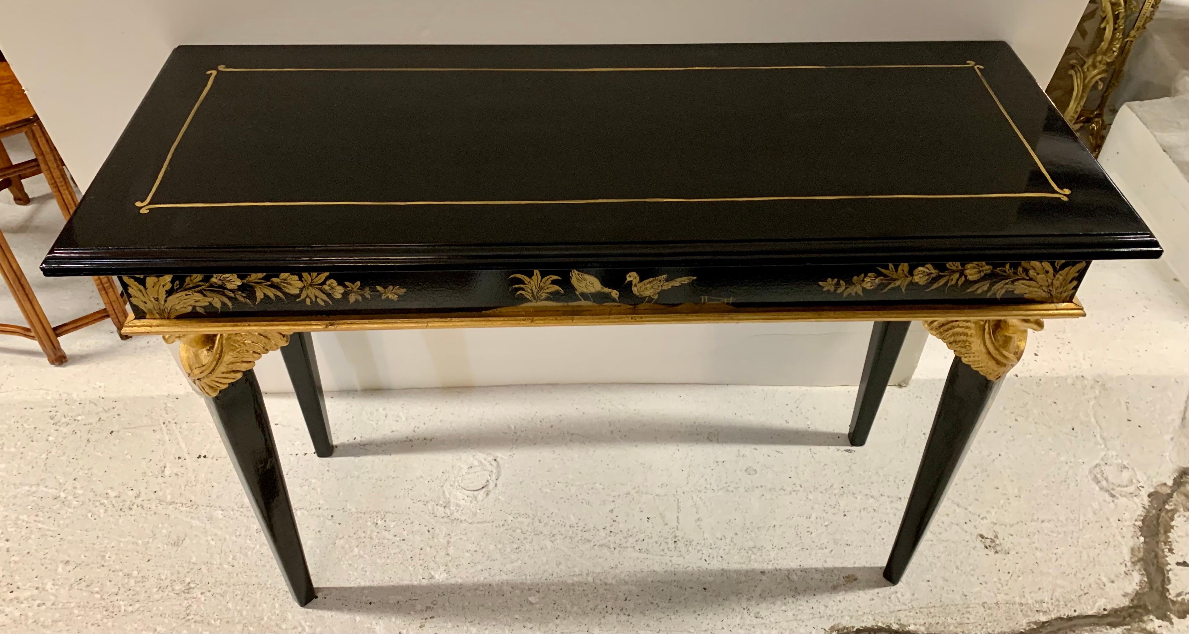 Stunning Italian Rococo neoclassical style black lacquered and gold painted console table that features birds prominently. Please see all pictures in the suite attached. Not to be missed. Now, more than ever, home is where the heart is.