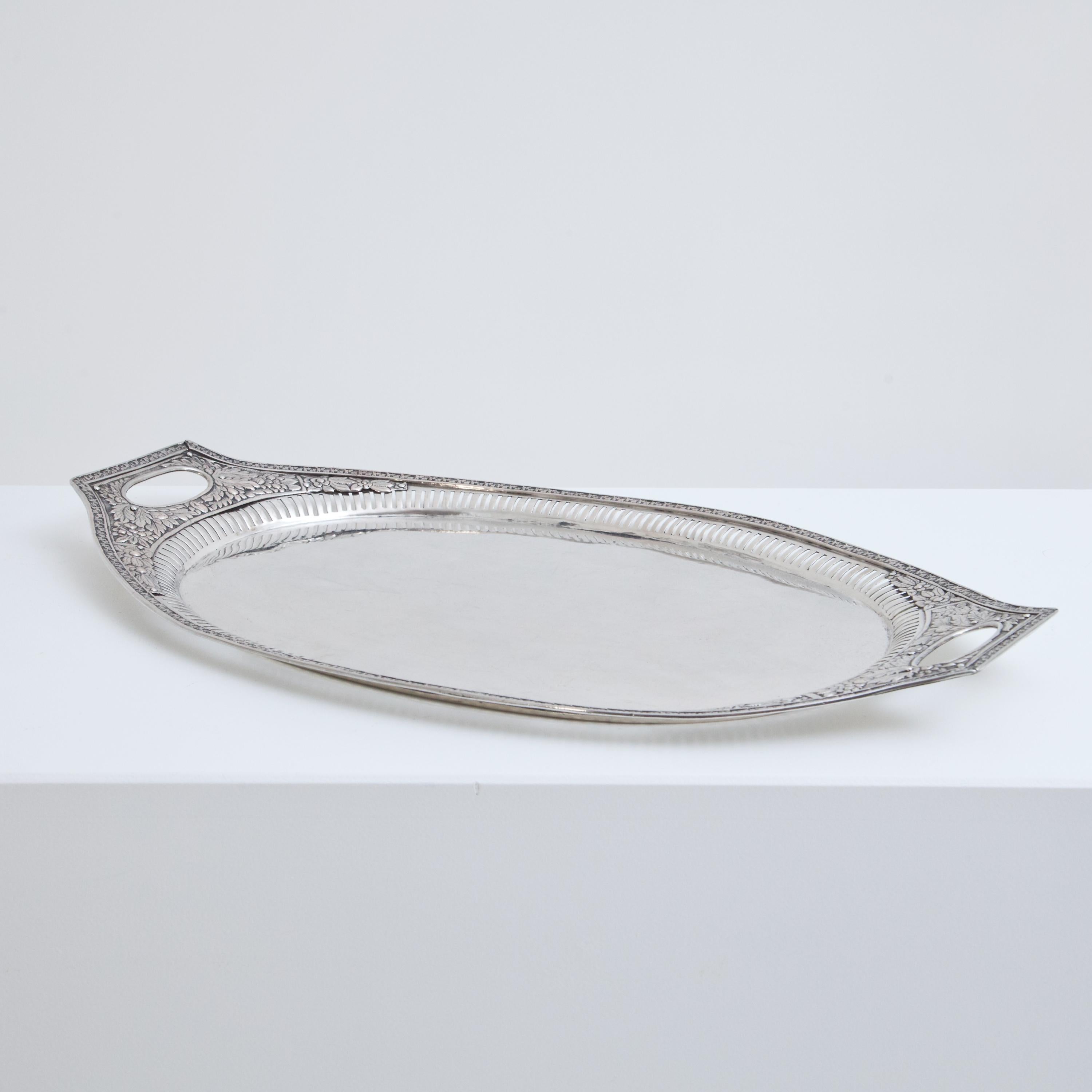 Large neoclassical silver tray with two handles in oval shape. Master probably Johann Christian Pohle. 1500g.