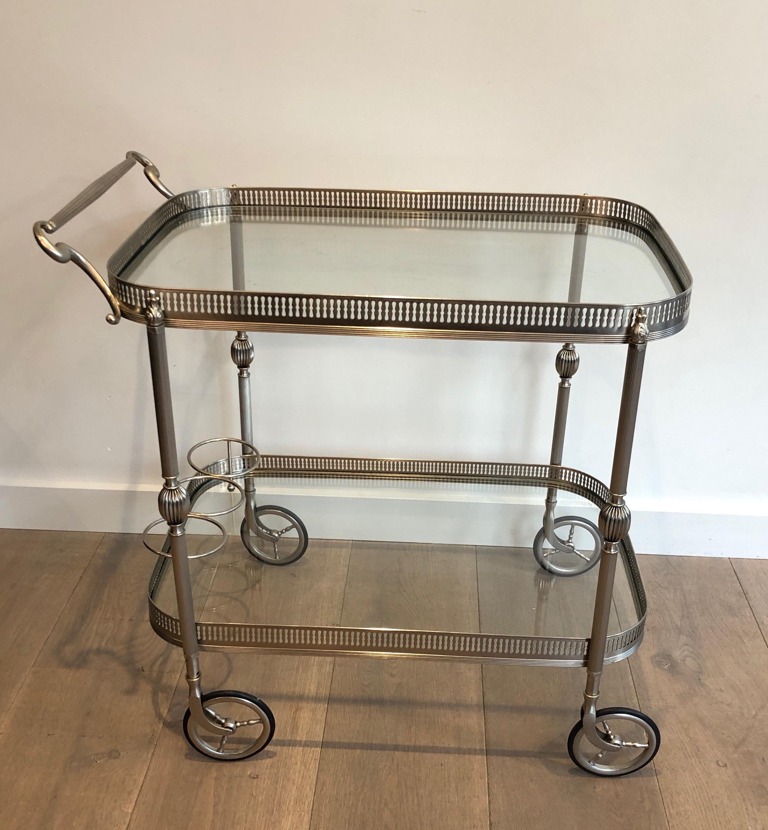 Neoclassical silvered brass drinks trolley in the style of Maison Jansen. French. Circa 1940.