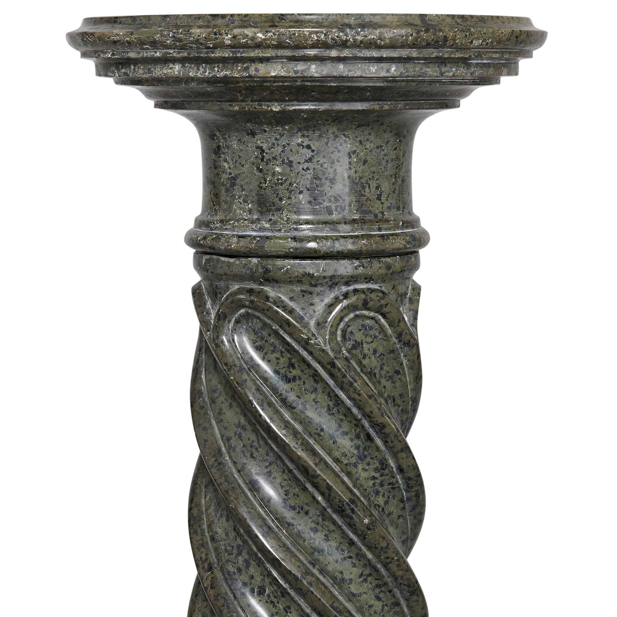 Neoclassical Solomonic green serpentine column
French, 19th century
Dimensions: Height 109cm, diameter 34cm

Of typical neoclassical form, this green serpentine marble Solomonic pedestal features an octagonal base with a twisted central column