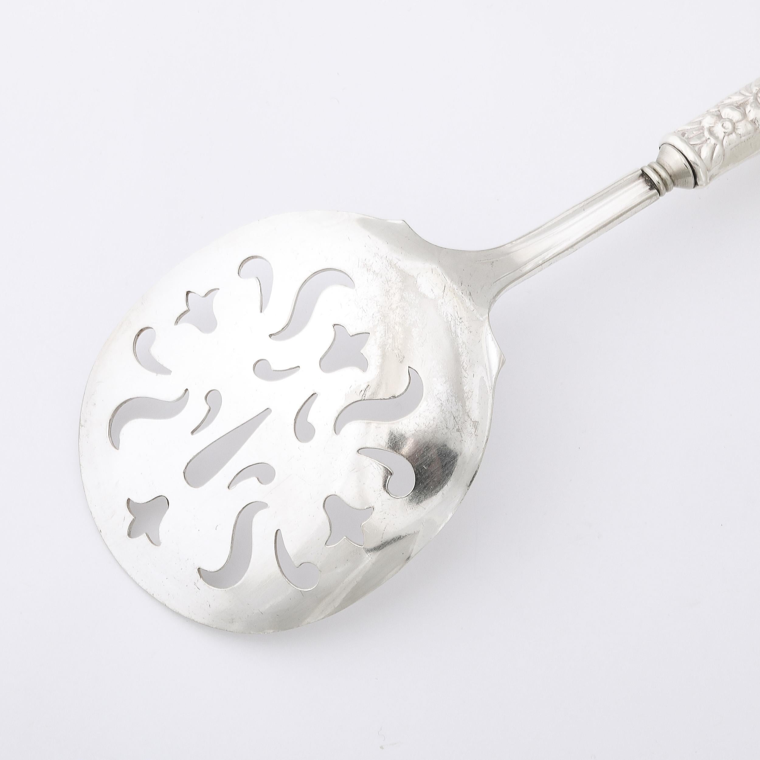 Mid-20th Century Neoclassical Sterling Silver Pierced Serving Spoon w/ Naturalist Relief Handle  For Sale