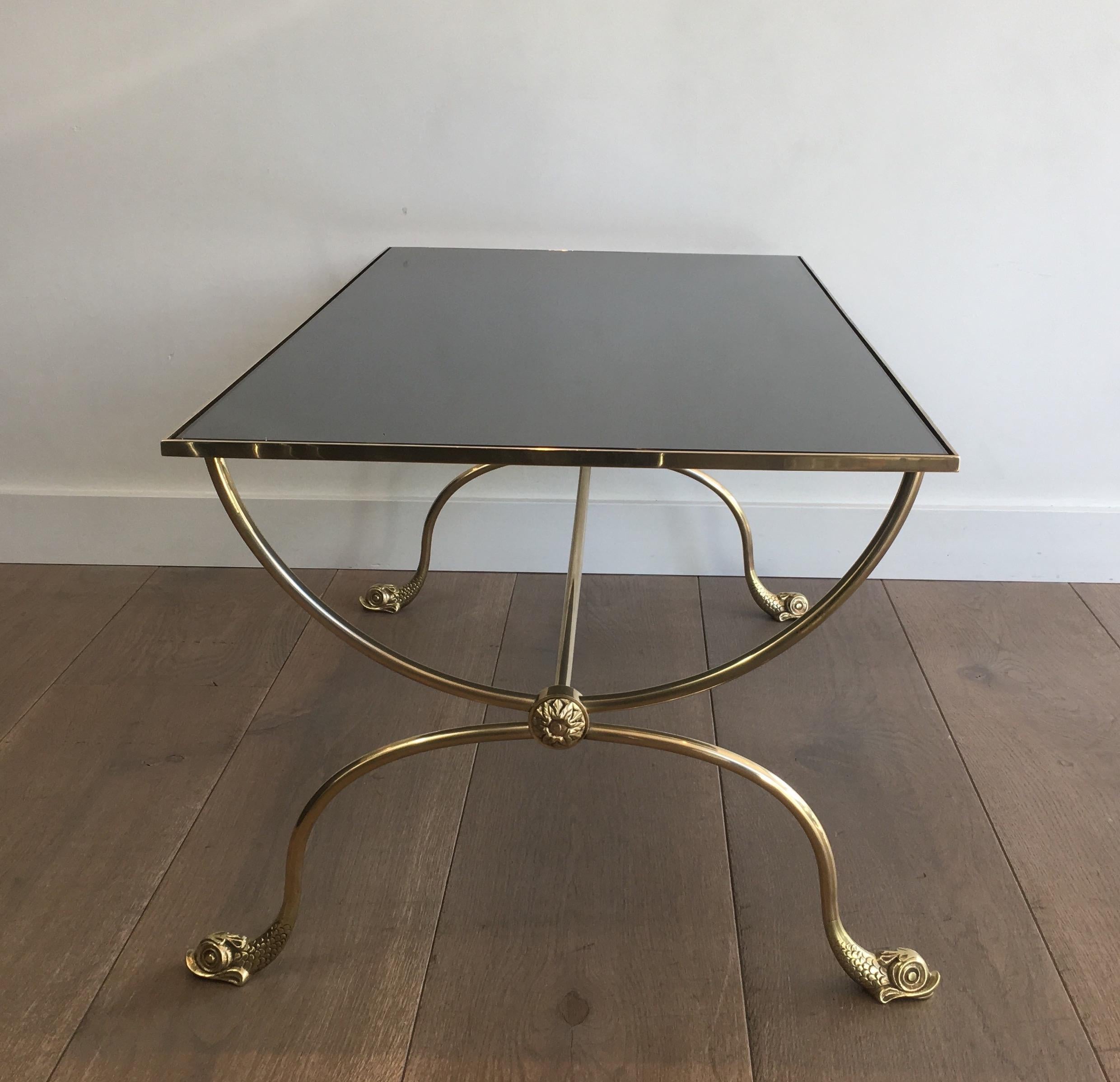 French Neoclassical Style Brass Coffee Table with Dolphins Heads and Mirror Top For Sale