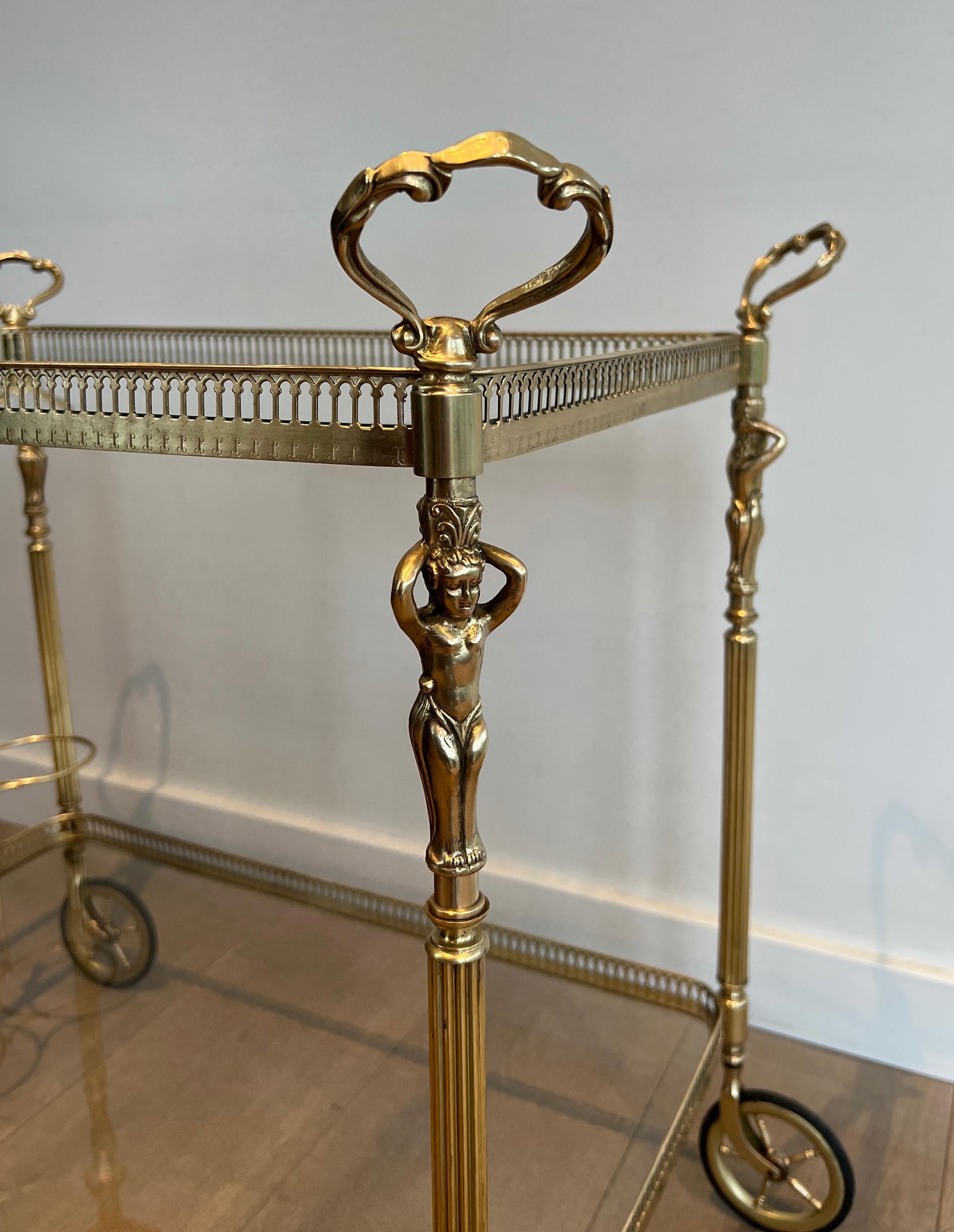 Mid-20th Century Neoclassical style brass drinks trolley with cherubs For Sale