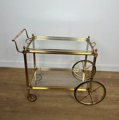 Neoclassical Style Brass Drinks Trolley with Lily Flowers. Maison Baguès.