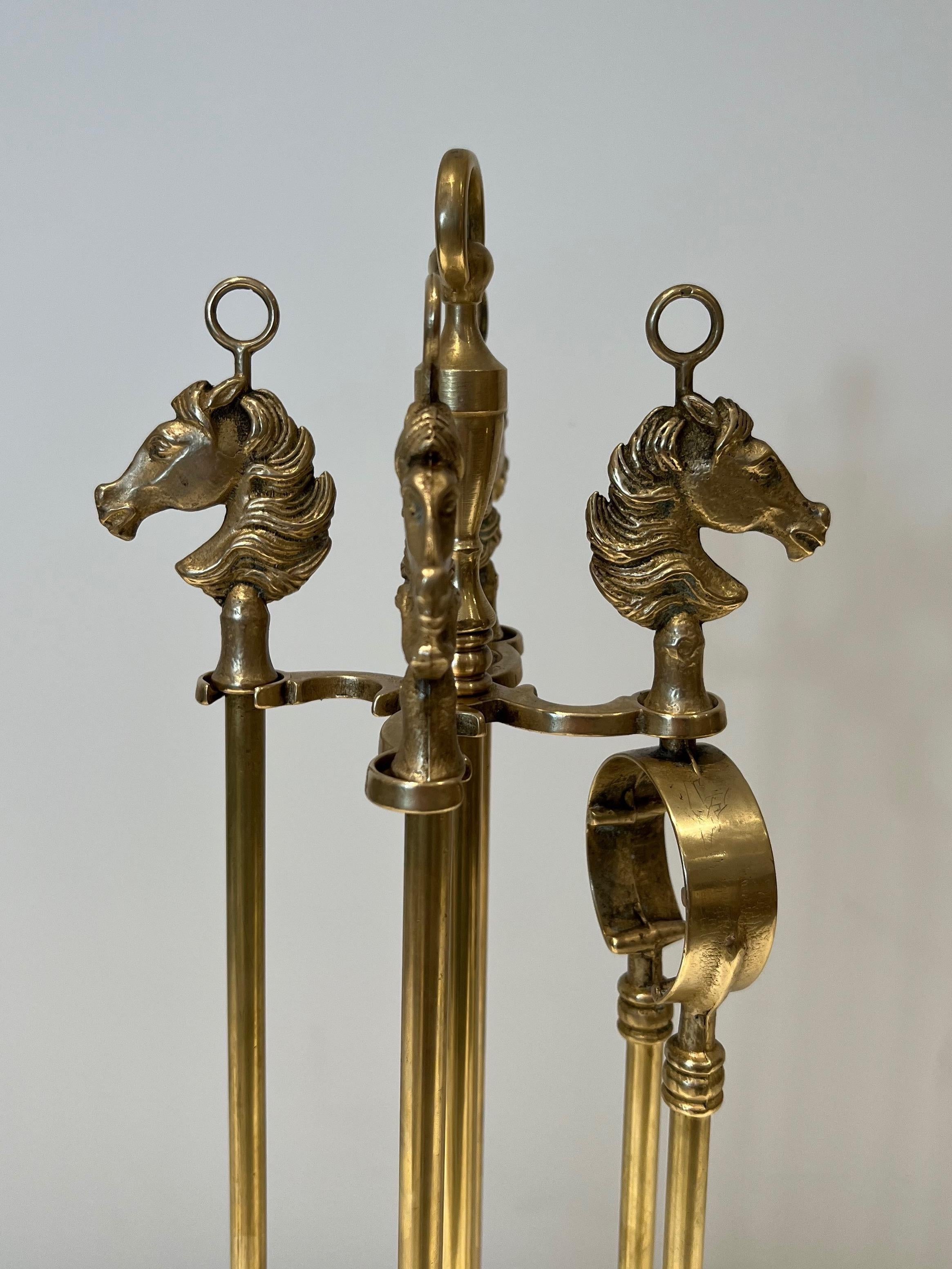 Mid-20th Century Neoclassical Style Brass HorseHeads Fireplace Tools in the Styl of Maison Jansen For Sale