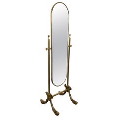 Neoclassical Style Brass Psyche Mirror with Dolphins Base. by Maison Jansen