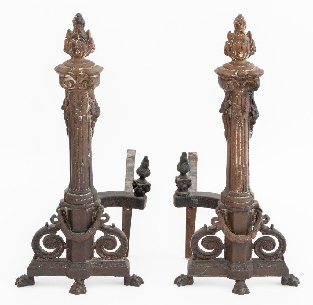 Pair of Neoclassical Style Bronze Andirons, with fluted columns and garland on three paw feet. 18