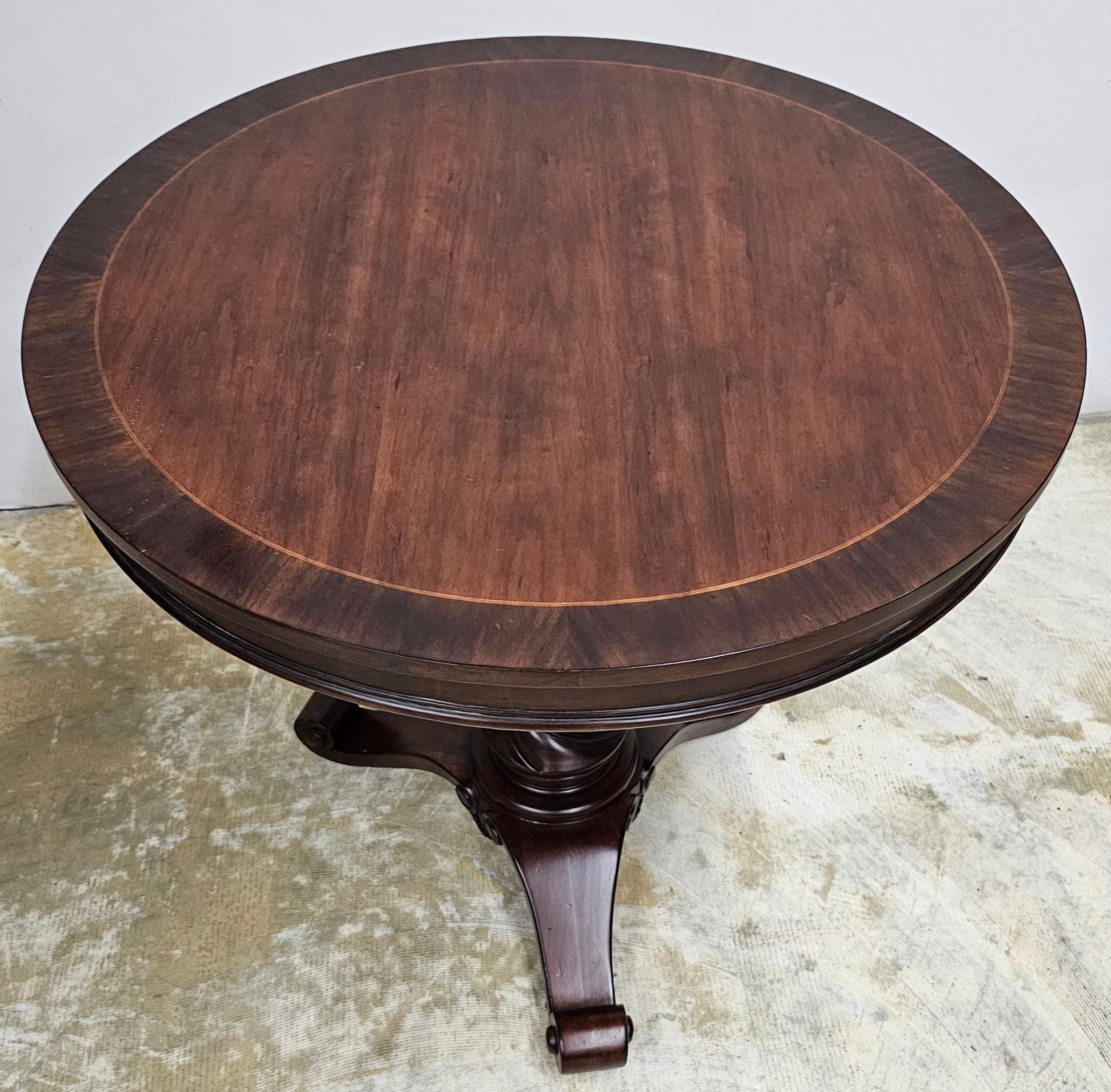 Neoclassical Style Carved and Cross-Banded Mahogany Pedestal Center Table In Excellent Condition For Sale In Germantown, MD