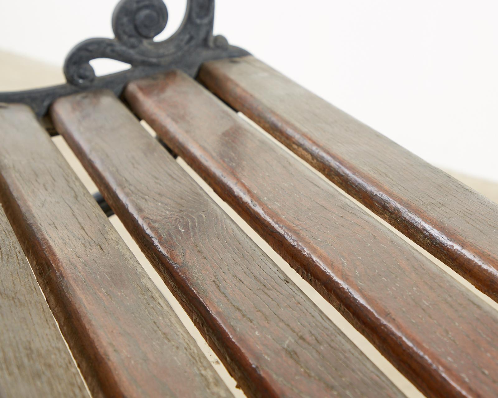 Neoclassical Style Cast Iron and Wood Park Bench 10