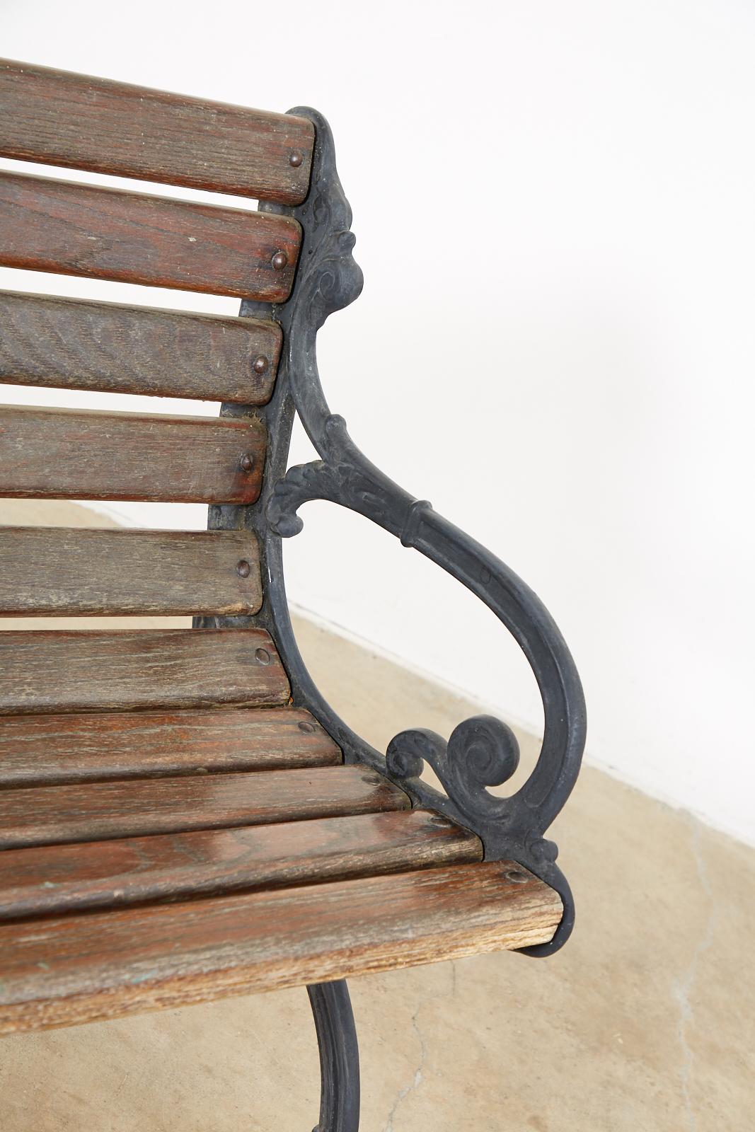 Neoclassical Style Cast Iron and Wood Park Bench 13