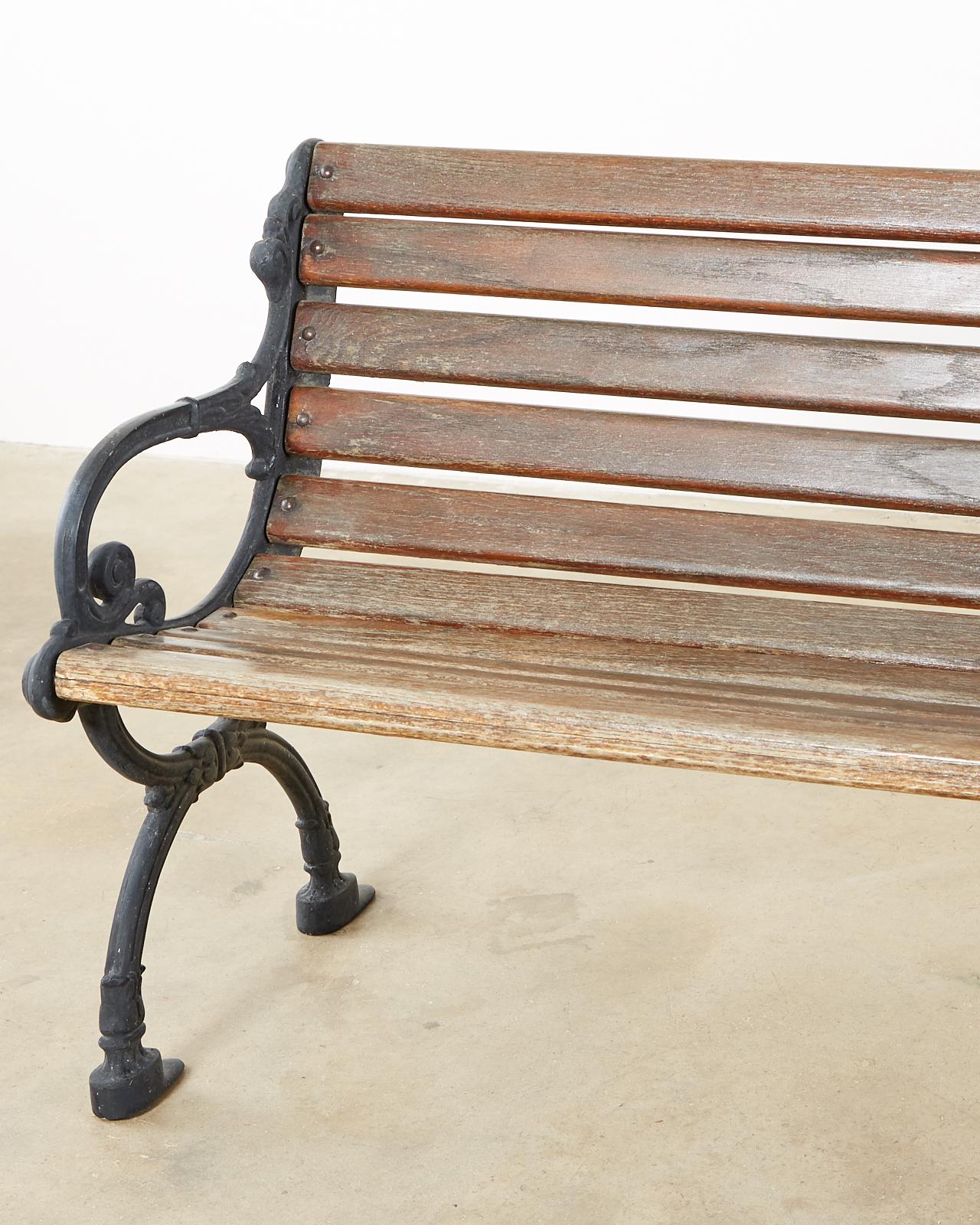 20th Century Neoclassical Style Cast Iron and Wood Park Bench