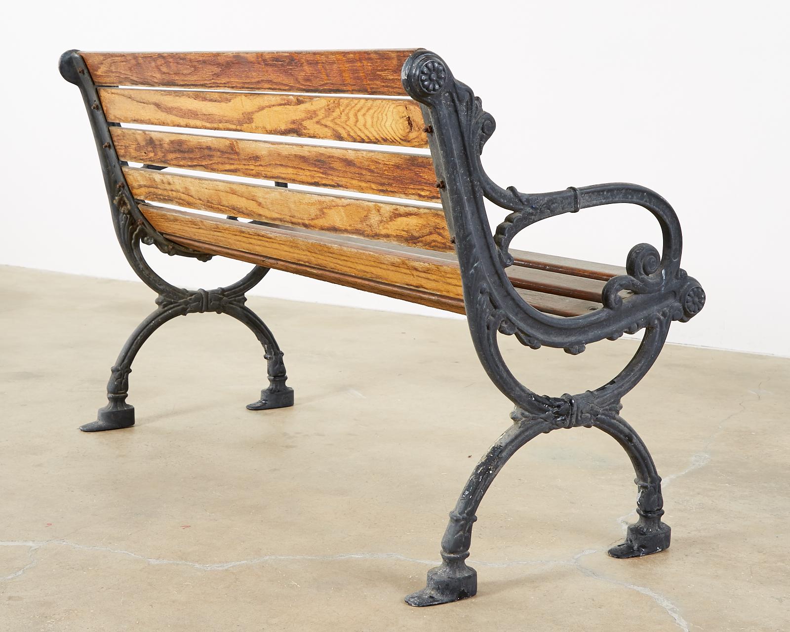 English Neoclassical Style Cast Iron and Wood Park Bench