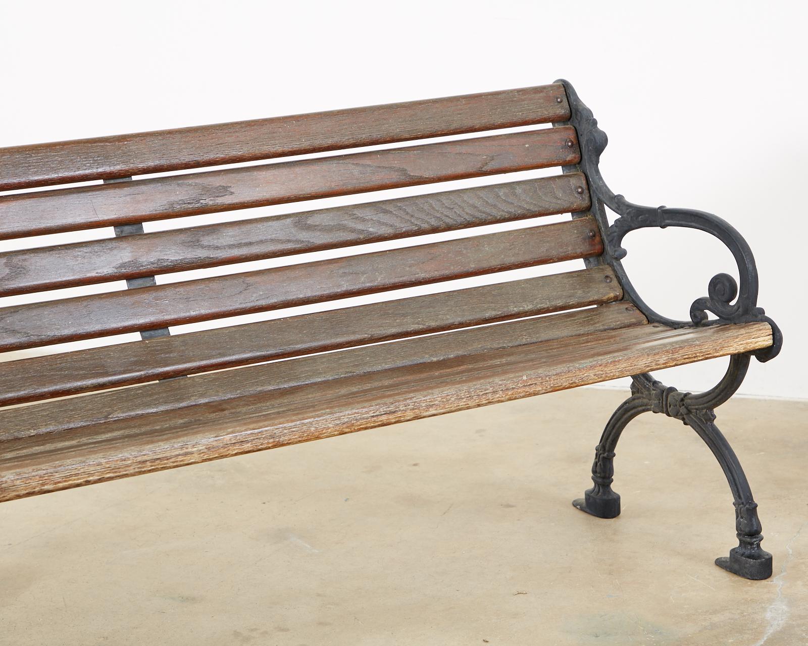 Neoclassical Style Cast Iron and Wood Park Bench 1
