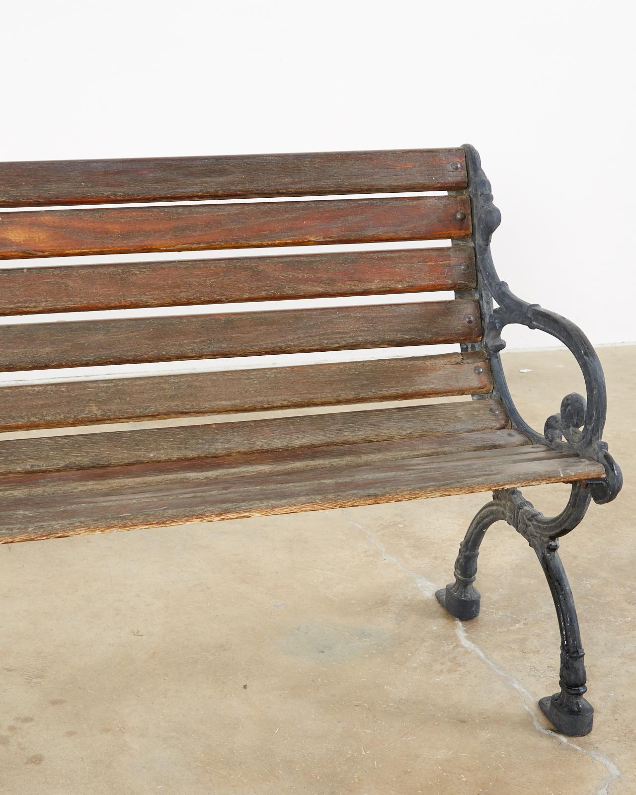 Neoclassical Style Cast Iron and Wood Park Bench 1