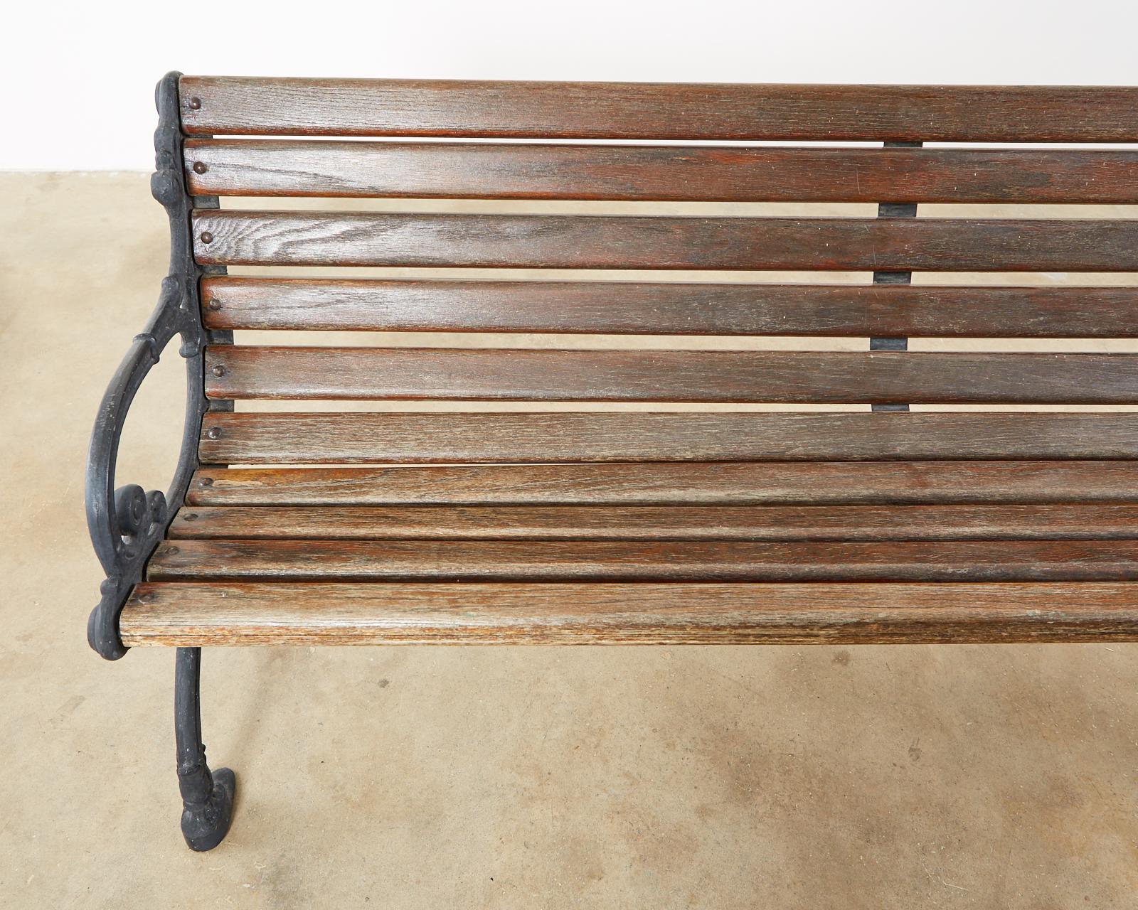 Neoclassical Style Cast Iron and Wood Park Bench 4