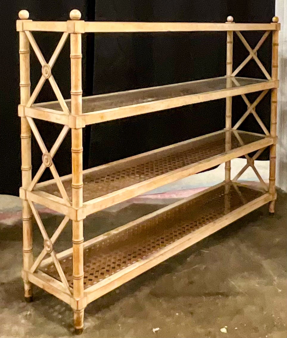 I love this piece! It is a neoclassical style cerused faux bamboo Etagere or bookcase. The piece appears to be pine but could be maple. The shelves are caned, and I did have glass cut for them for support. The feet have brass caps. It most likely