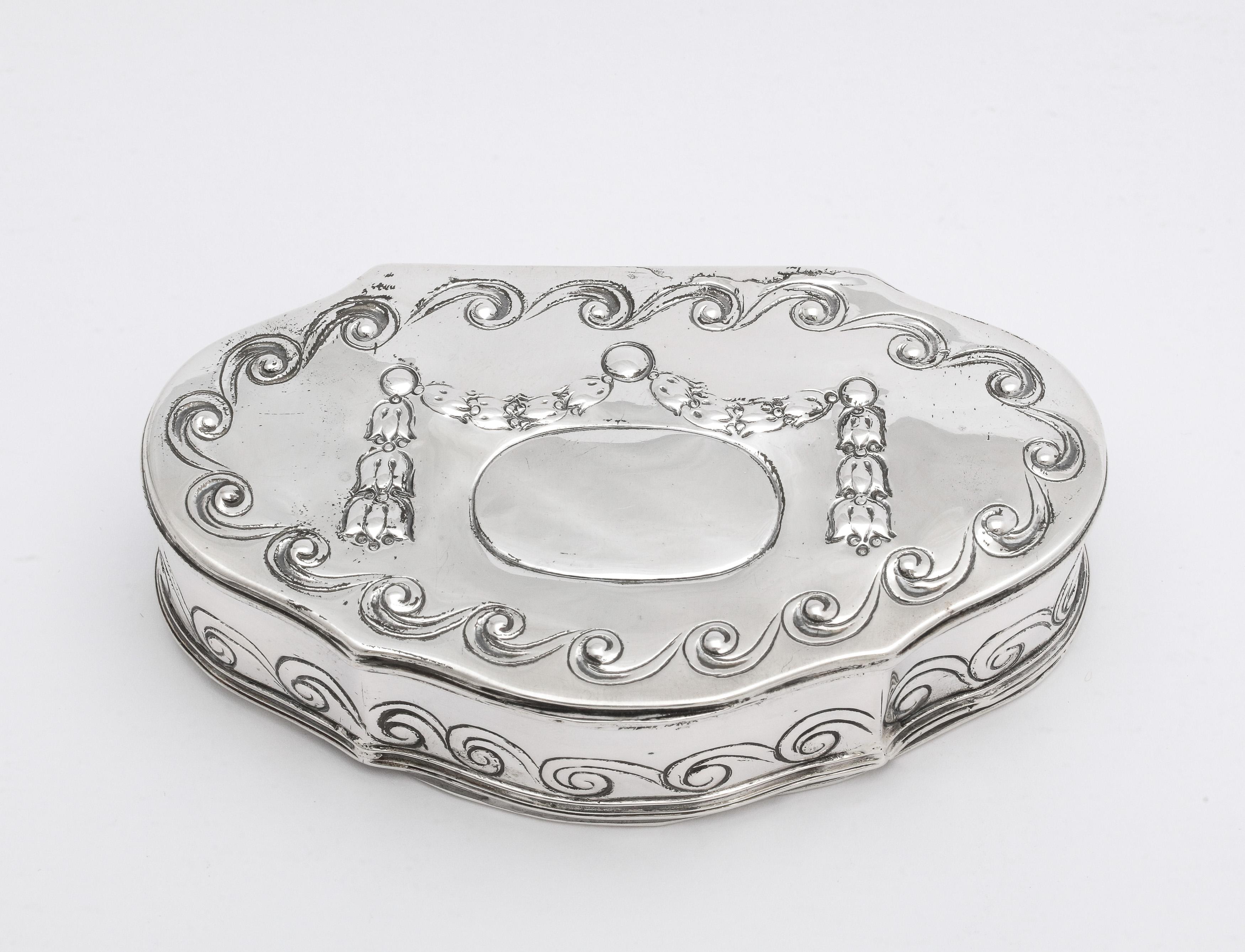 19th century, Neoclassical style, Continental Silver (.800) and mother-of-pearl trinkets box with hinged lid, Germany, Ca. 1855. Designed with lovely swags and waves. Vacant cartouche. Inside bottom and underside of box are made from