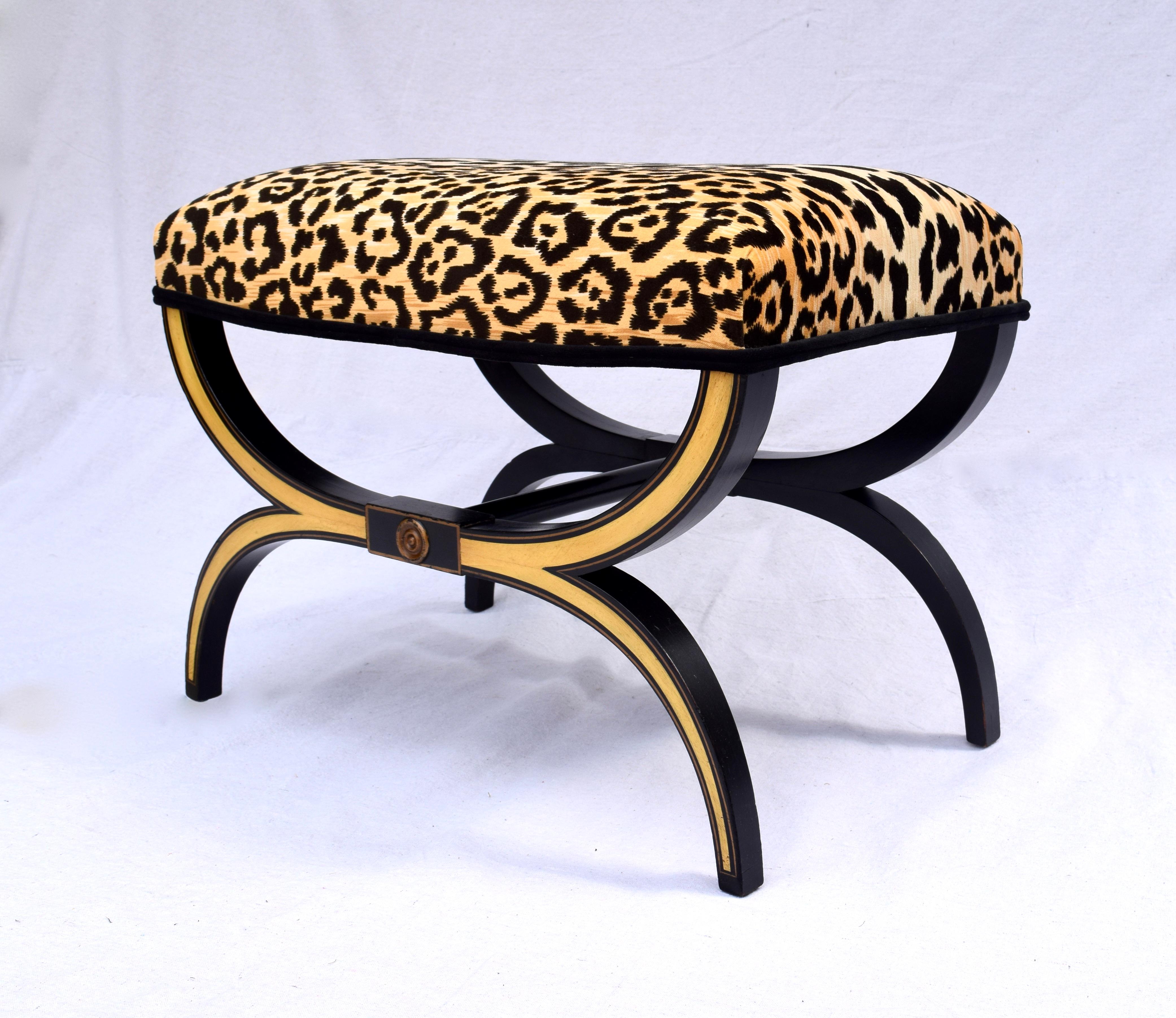 Neoclassical style Curule bench, stool or cocktail ottoman newly upholstered in leopard velvet. Original finish fully detailed and in excellent vintage condition.