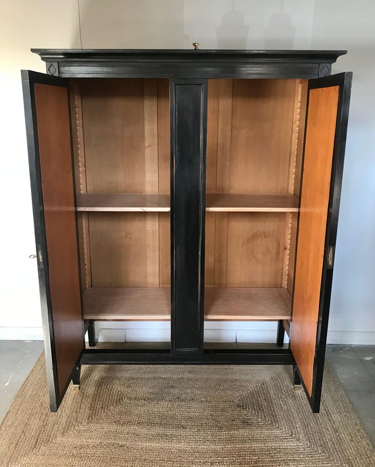 Neoclassical Style Ebonized Bar Cabinet Having Mirrored Doors