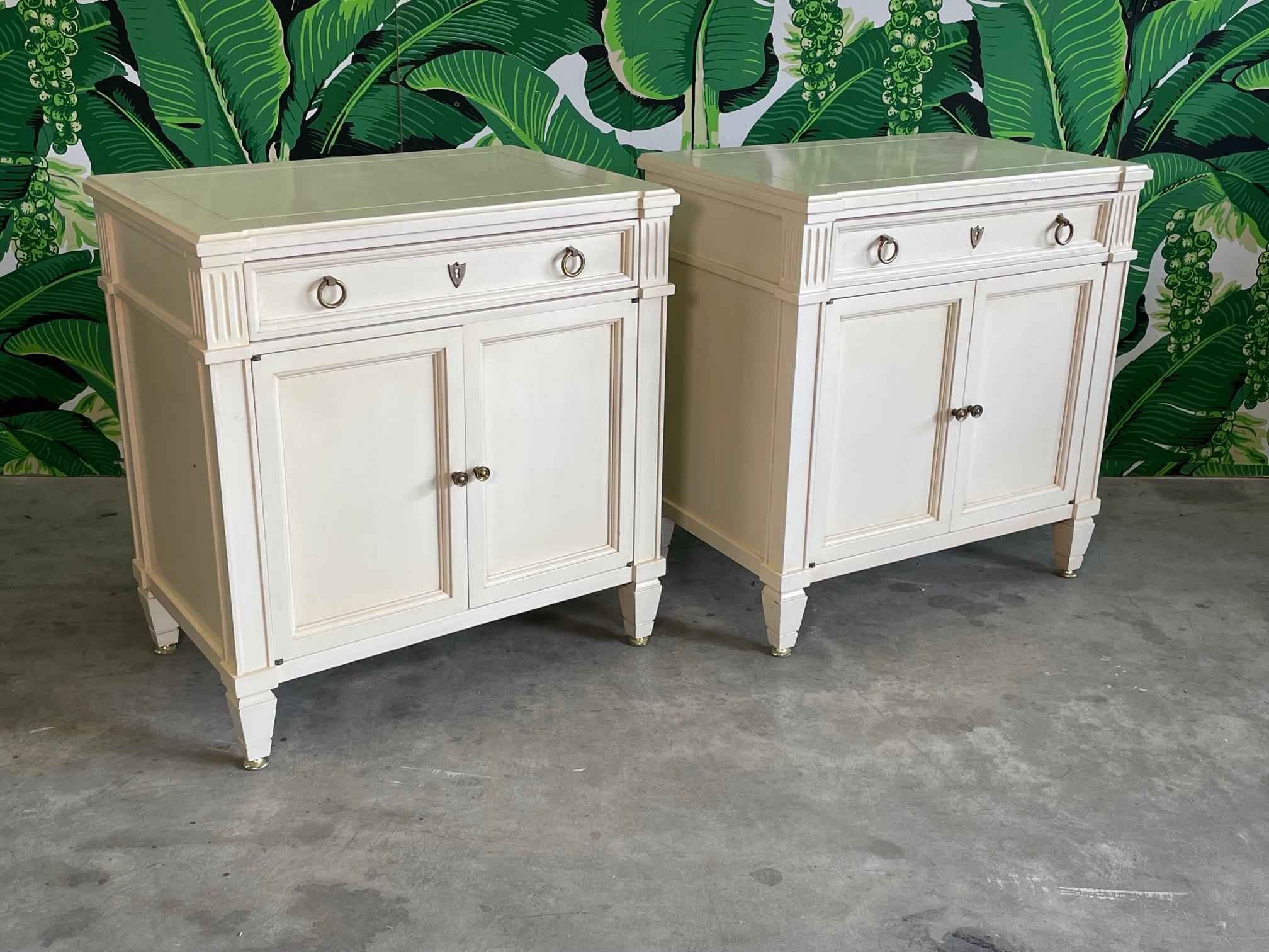 Pair of Neoclassic side tables feature column corners and fluted detailing, Good condition with minor imperfections consistent with age. May exhibit scuffs, marks, or wear, see photos for details.

 