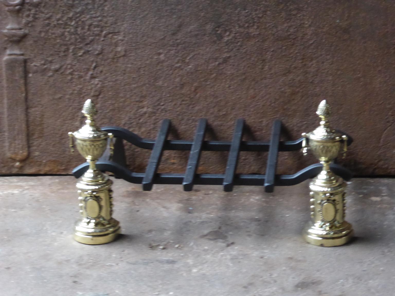 20th century French Napoleon III style fireplace basket - fire basket made of wrought iron and polished brass. The basket is in a good condition and is fully functional.