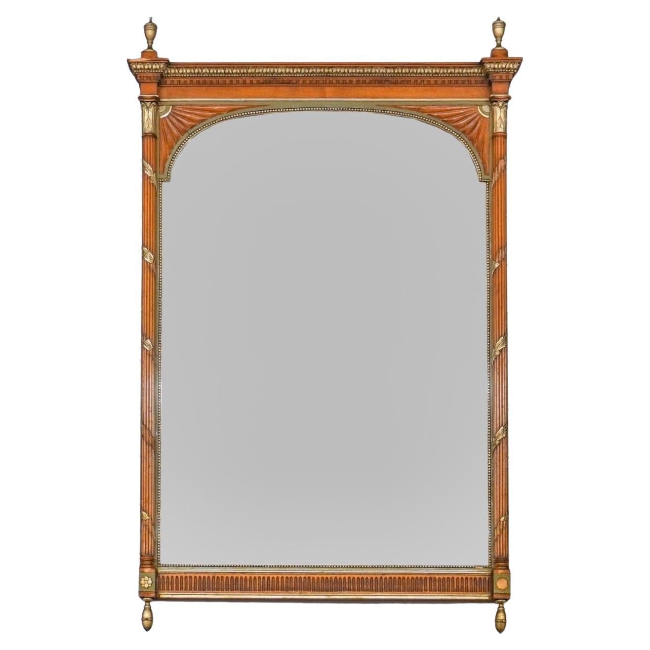 Specchio ornamentale in stile neoclassico con cornice dorata in legno e pacchi di frutta