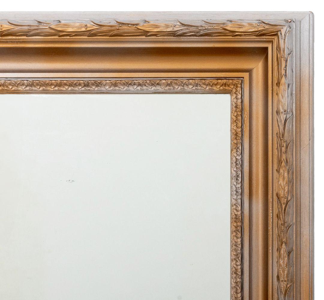 Neoclassical Style Gilt and Silvered Washed Mirror, the molded, berried laurel and acanthus-cast mirror frame washed with gold and silver paint, centering a rectangular mirror plate. 66