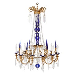 Lustre de style néoclassique en bronze doré, verre transparent et verre taillé bleu