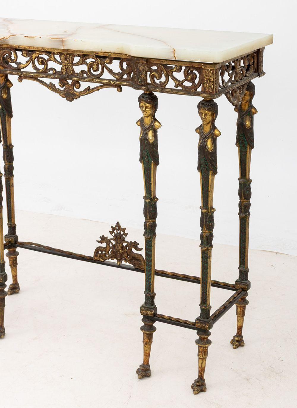 Consola de metal dorado y ónice de estilo neoclásico siglo XX en venta