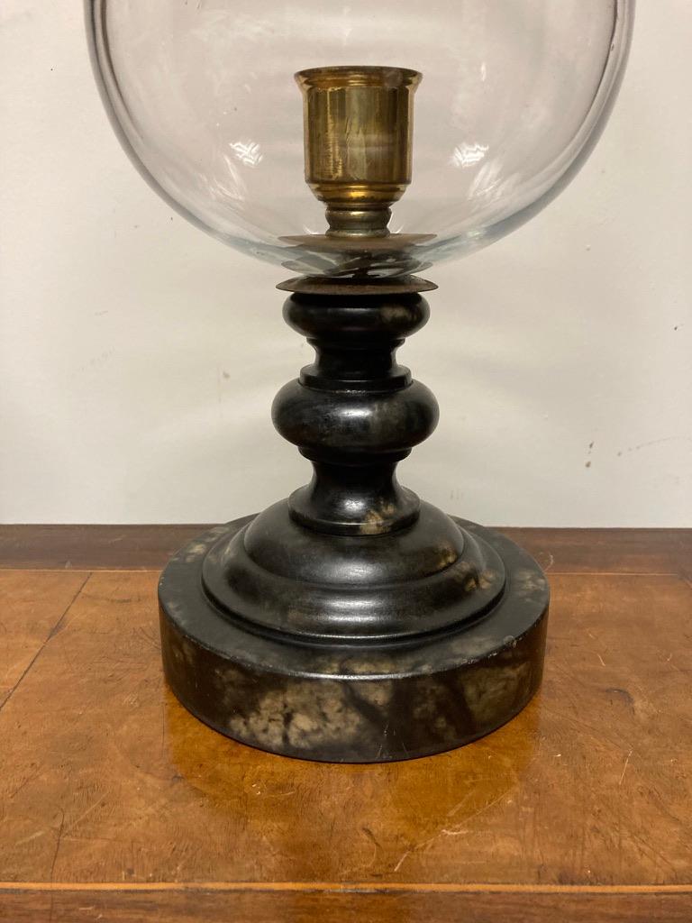 An Italian photophore with an unusual turned and stained alabaster base. With brass candle holder and hand blown glass shade. Mid 20th century, a modern interpretation of a classic form. 
Bobeche marked 'Made in Italy'. Base also marked 'Italy'.