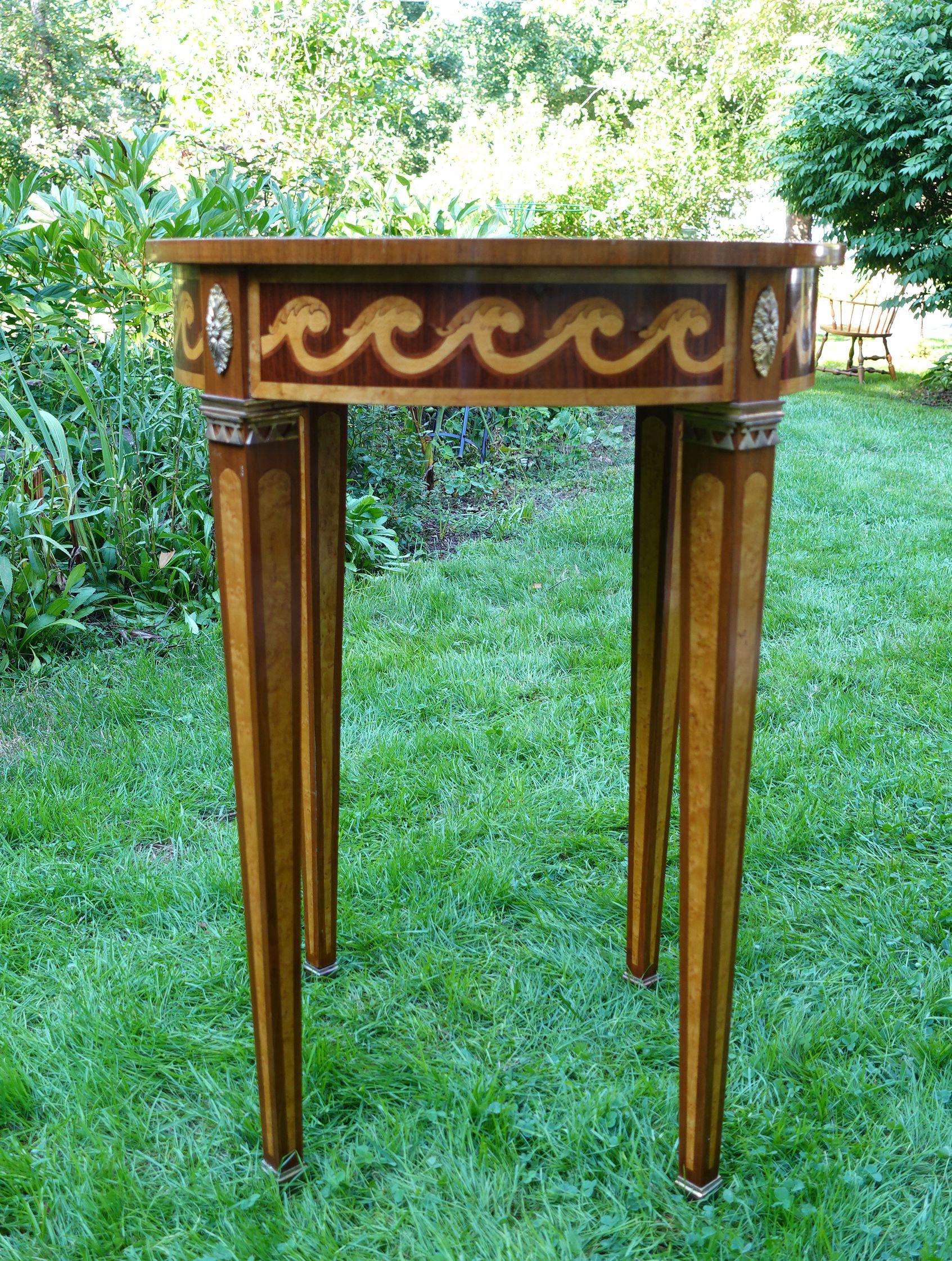 Neoclassical-style Italian inlaid drum table, measures: 30