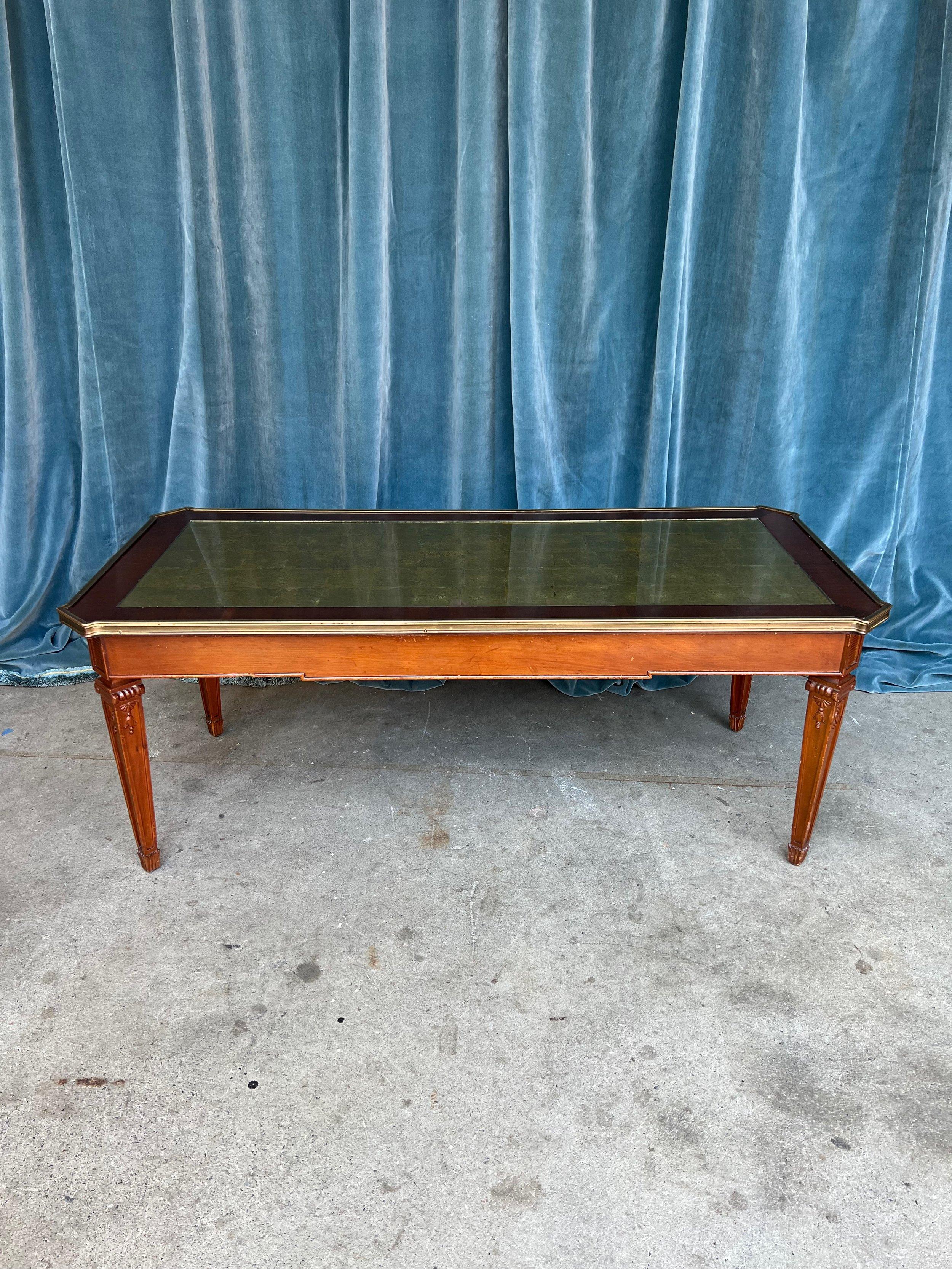 Brass Neoclassical Style Mahogany Coffee Table with Gold Leaf Top For Sale