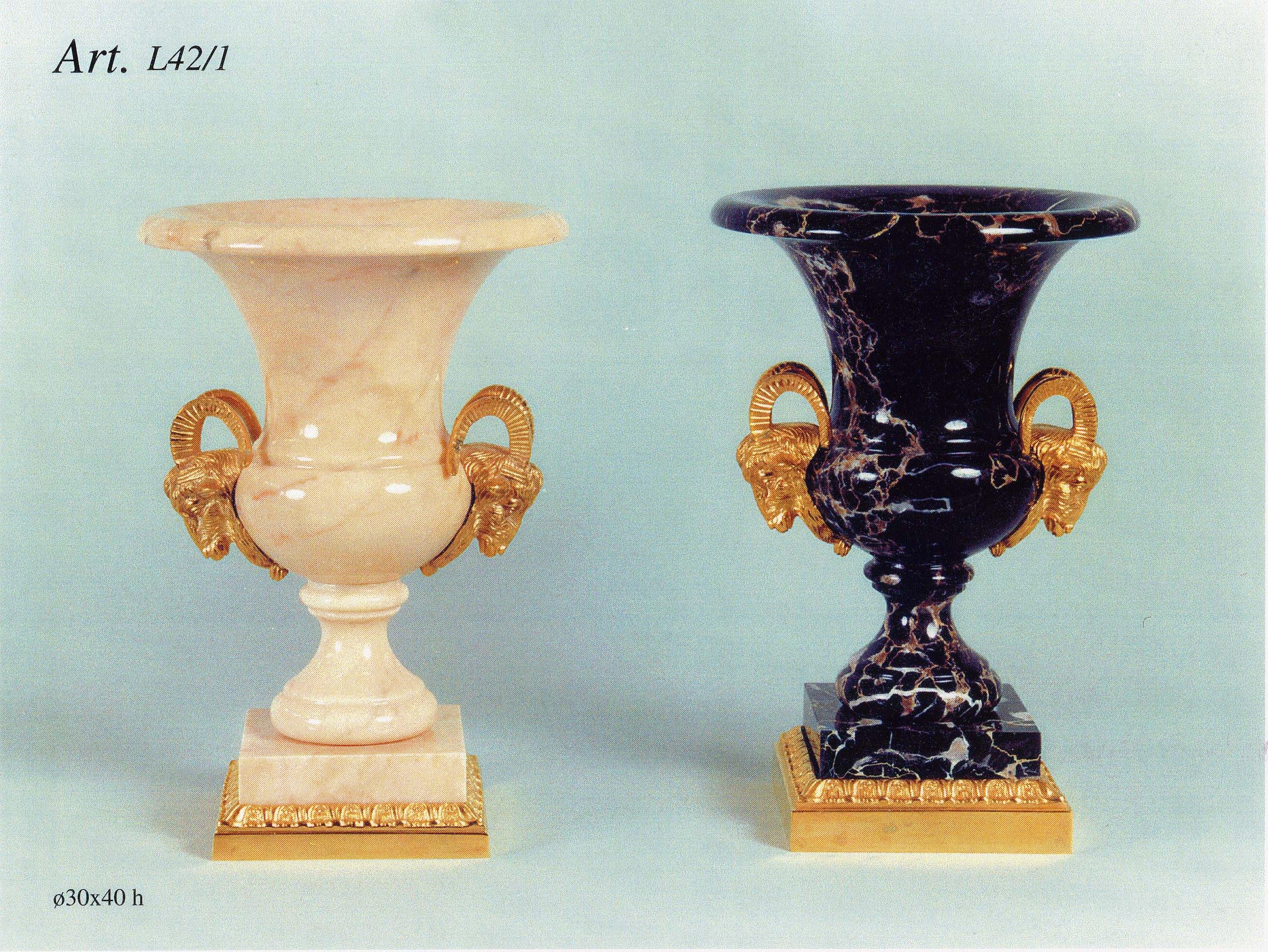 Neoclassical style marble and gilt bronze vase by Gherardo Degli Albizzi.
The shape comes from the Greek Kalyx type, quite common in antique, Greece. The vase under the small neck rests on a square base. Under this, there is a gilt bronze counter