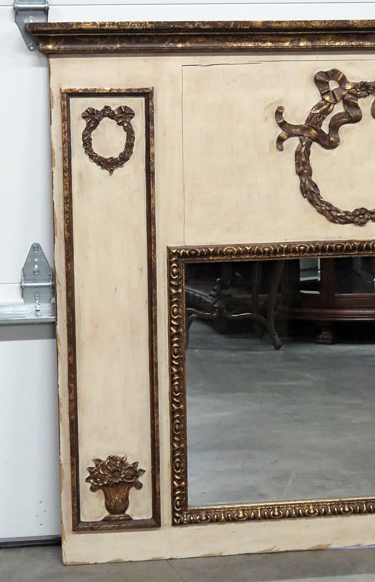 Neoclassical style mirror with gilt decor. Mirror size: 32