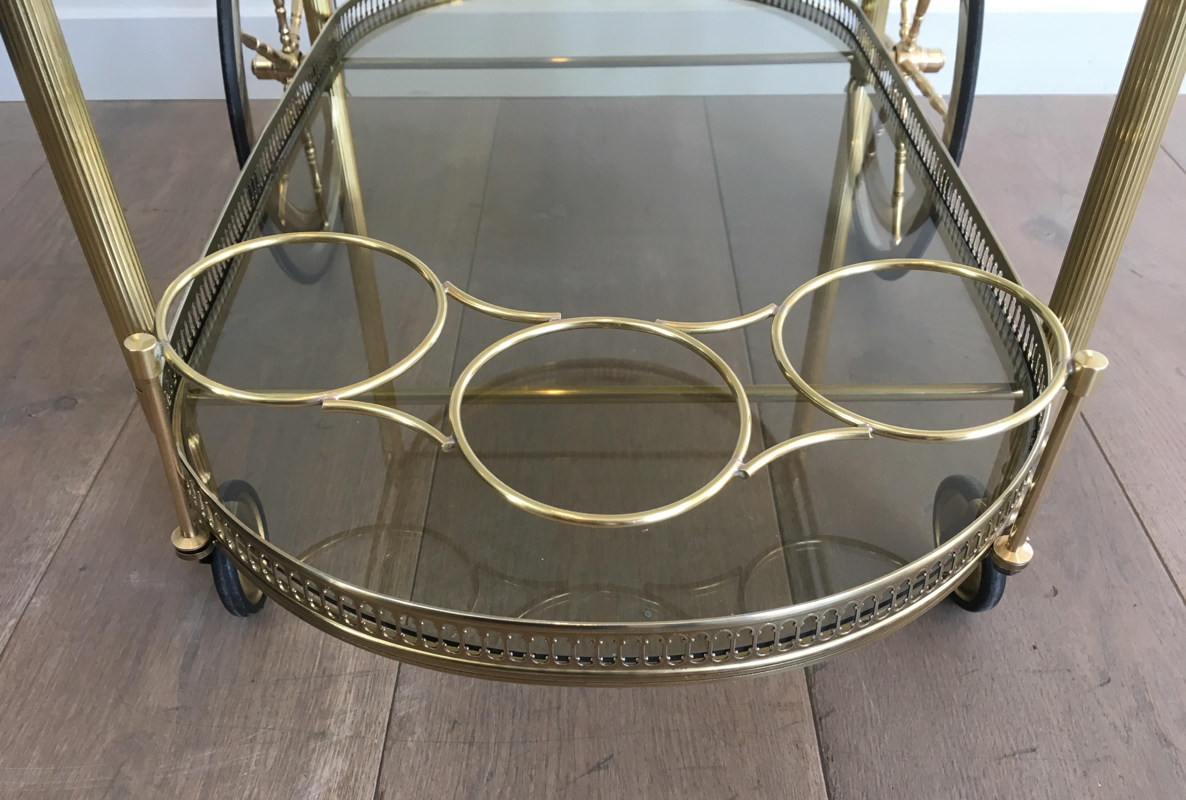 Neoclassical Style Oval Brass and Gilt Bar Cart with Greenish Smoked Glass 4