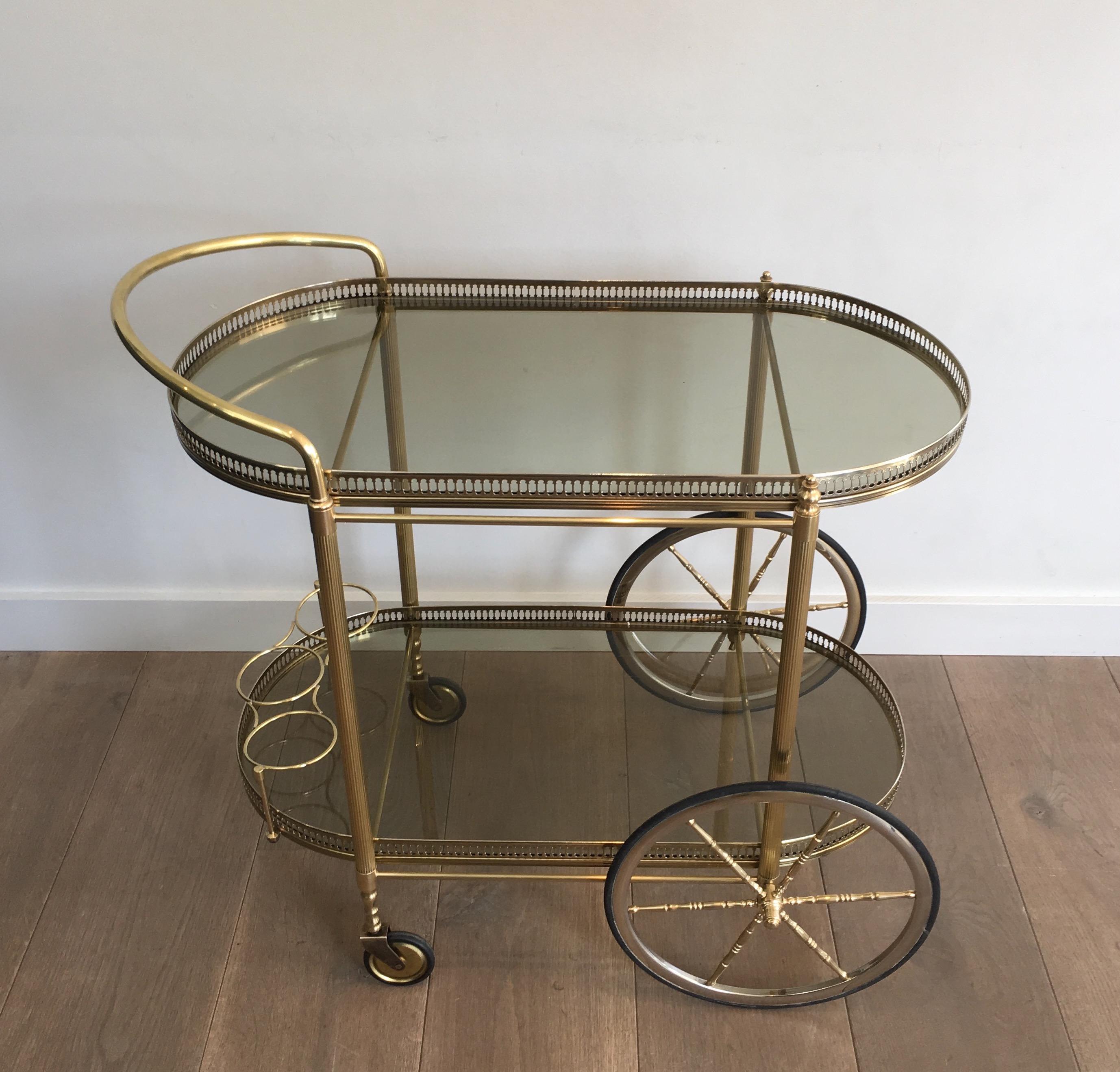 French Neoclassical Style Oval Brass and Gilt Bar Cart with Greenish Smoked Glass