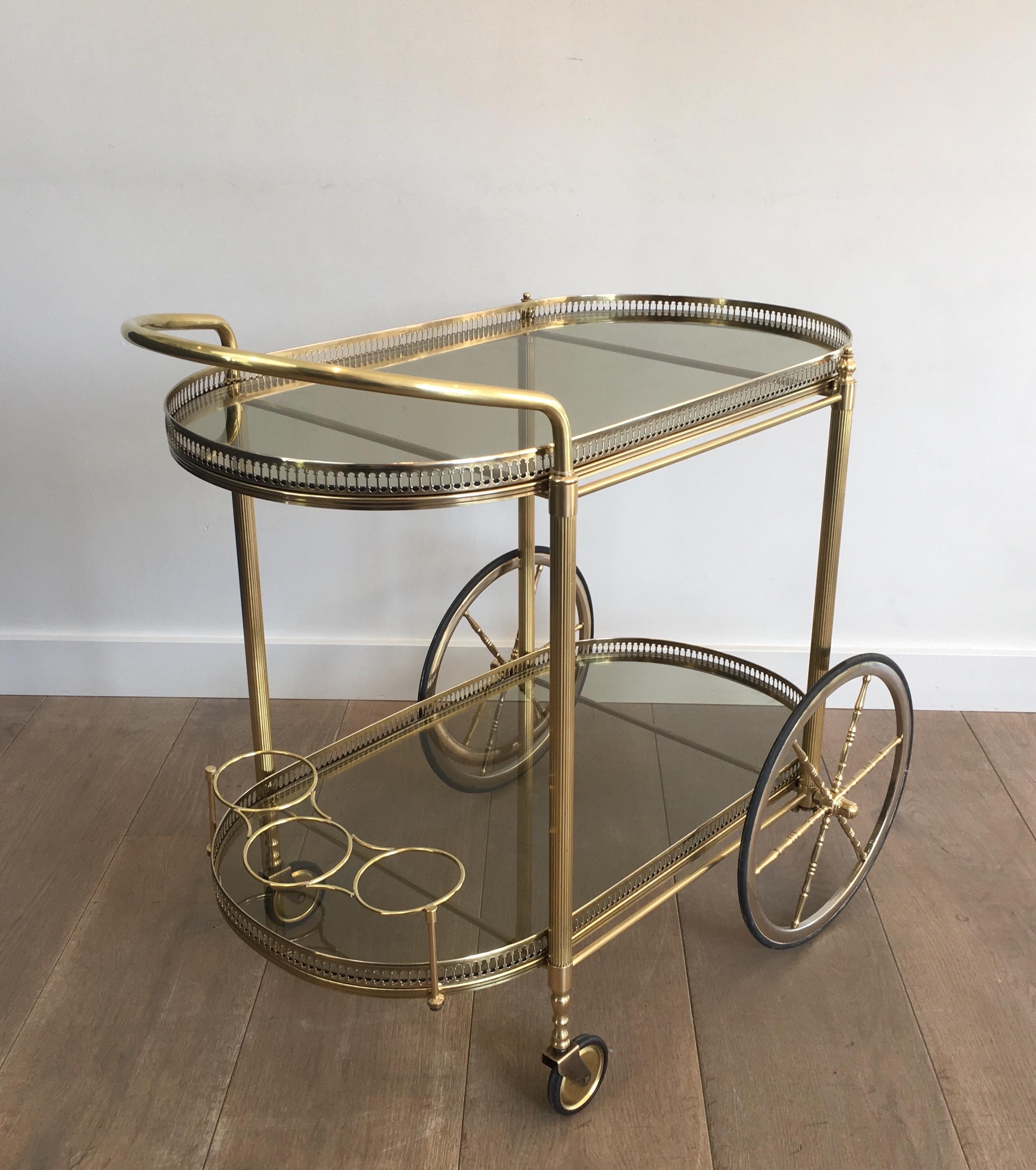Silvered Neoclassical Style Oval Brass and Gilt Bar Cart with Greenish Smoked Glass