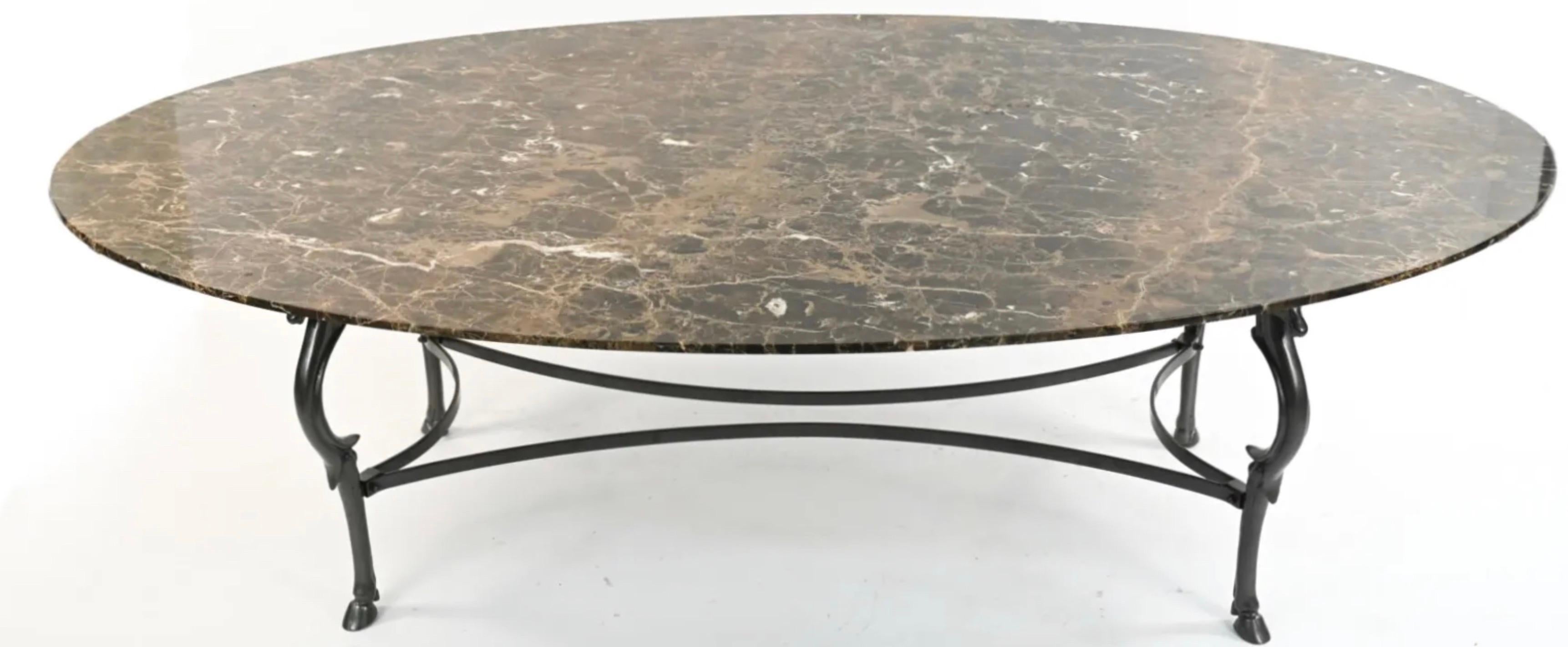 Mid-Century elegant custom designed oval marble dining table with gray-lacquered iron base, horse head legs and hoof feet, 1/2
