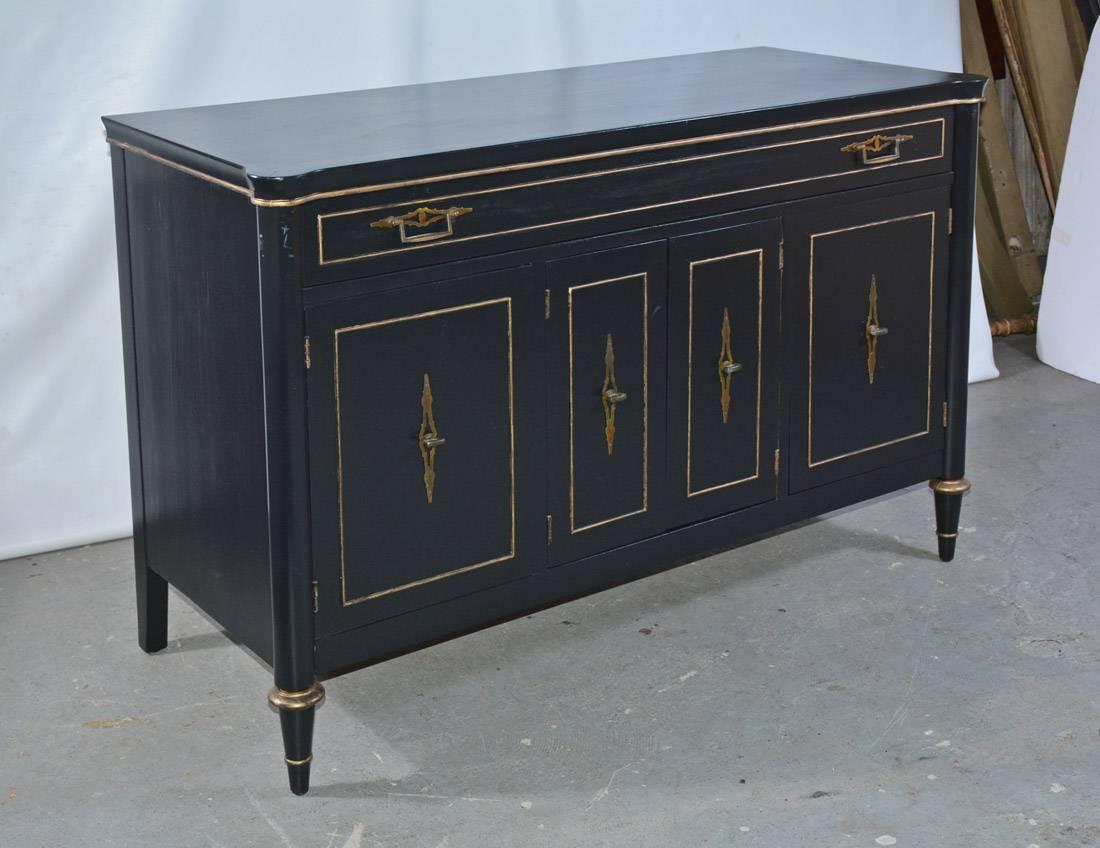 Stylish and chic, this neoclassical piece has two large drawers, two small and two larger storage areas with doors. Perfect as dresser, bathroom vanity base or server.
