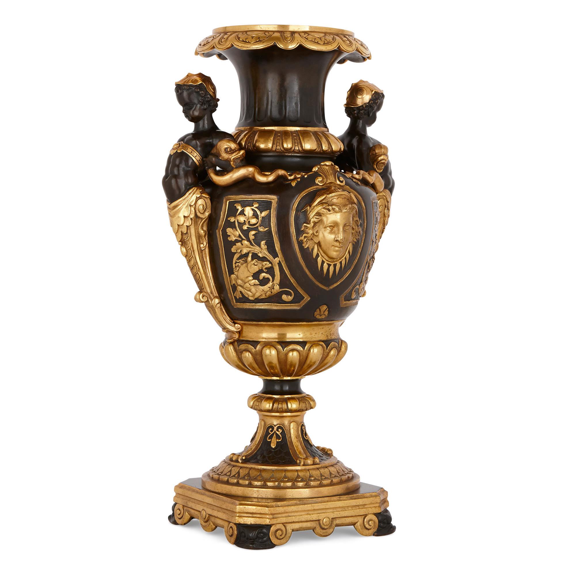 This vase is a truly beautiful antique piece, which is finely decorated with sea-themed motifs. The vase’s ovoid body is topped by a neck with a flared mouth. The patinated bronze neck is encircled, at its base, by a gilt bronze gadrooned belt, and