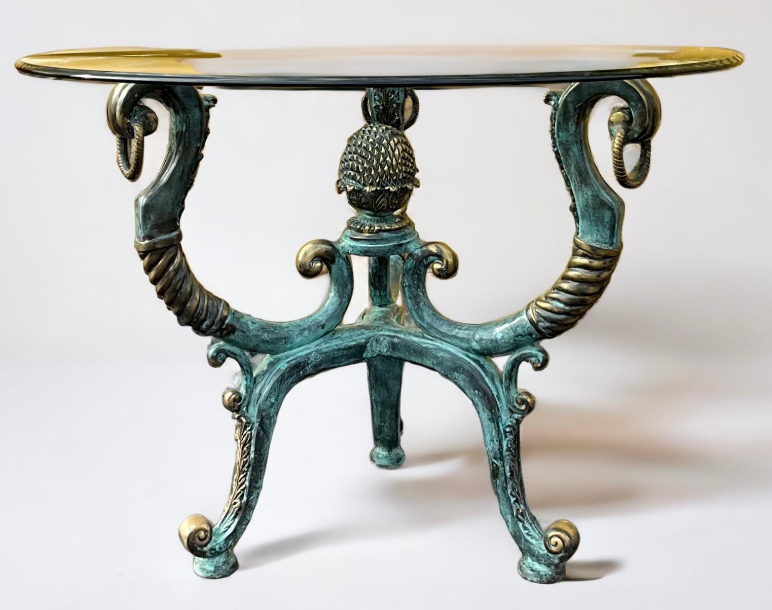 This is a neoclassical style patinated brass center table by LaBarge. The base is large enough to support a larger piece of glass. It is in very good condition. LaBarge pieces were typically Italian.